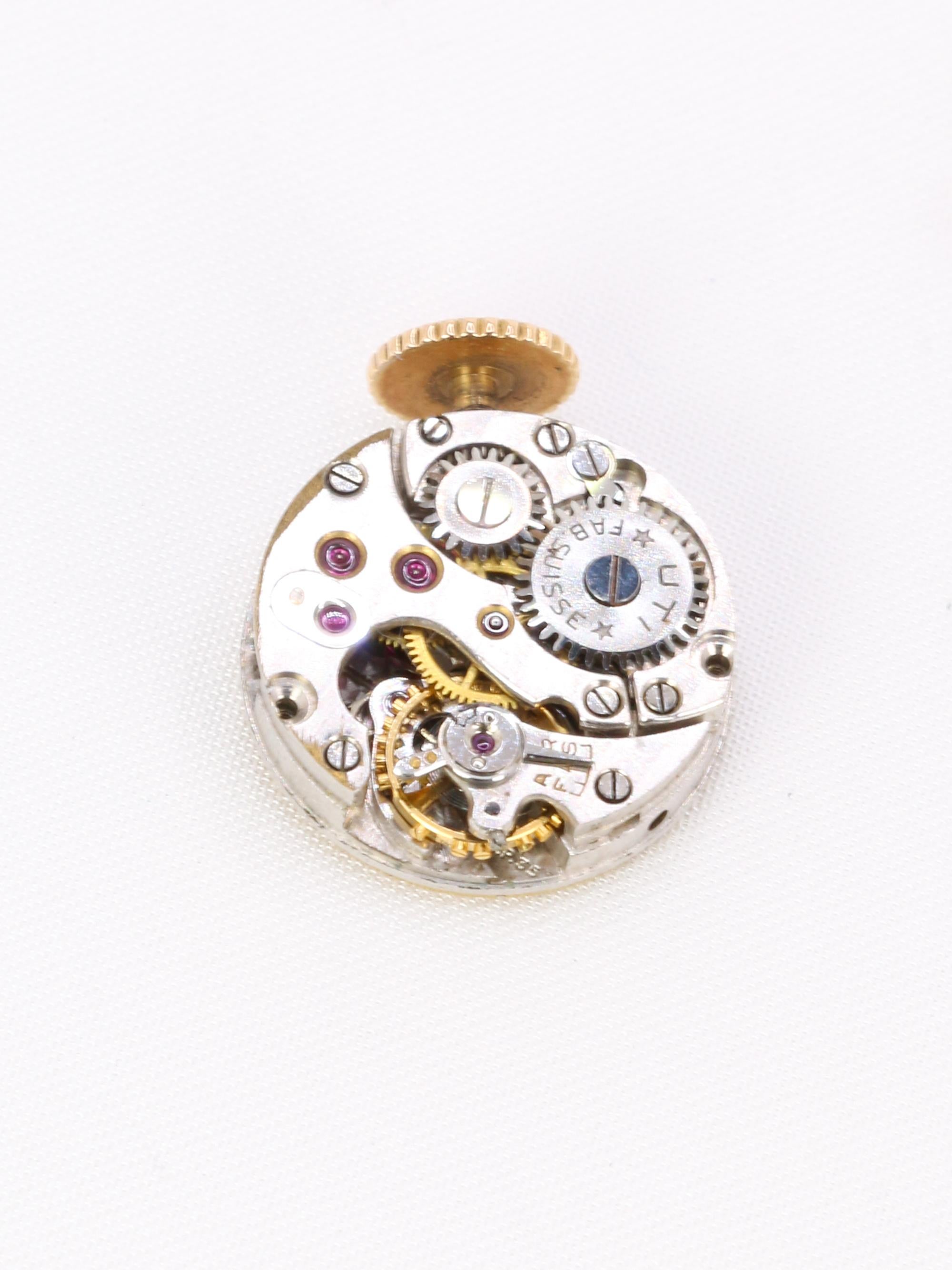 UTI - Geheime Uhr aus Gold, Diamanten und kalibrierten Rubinen im Angebot 1