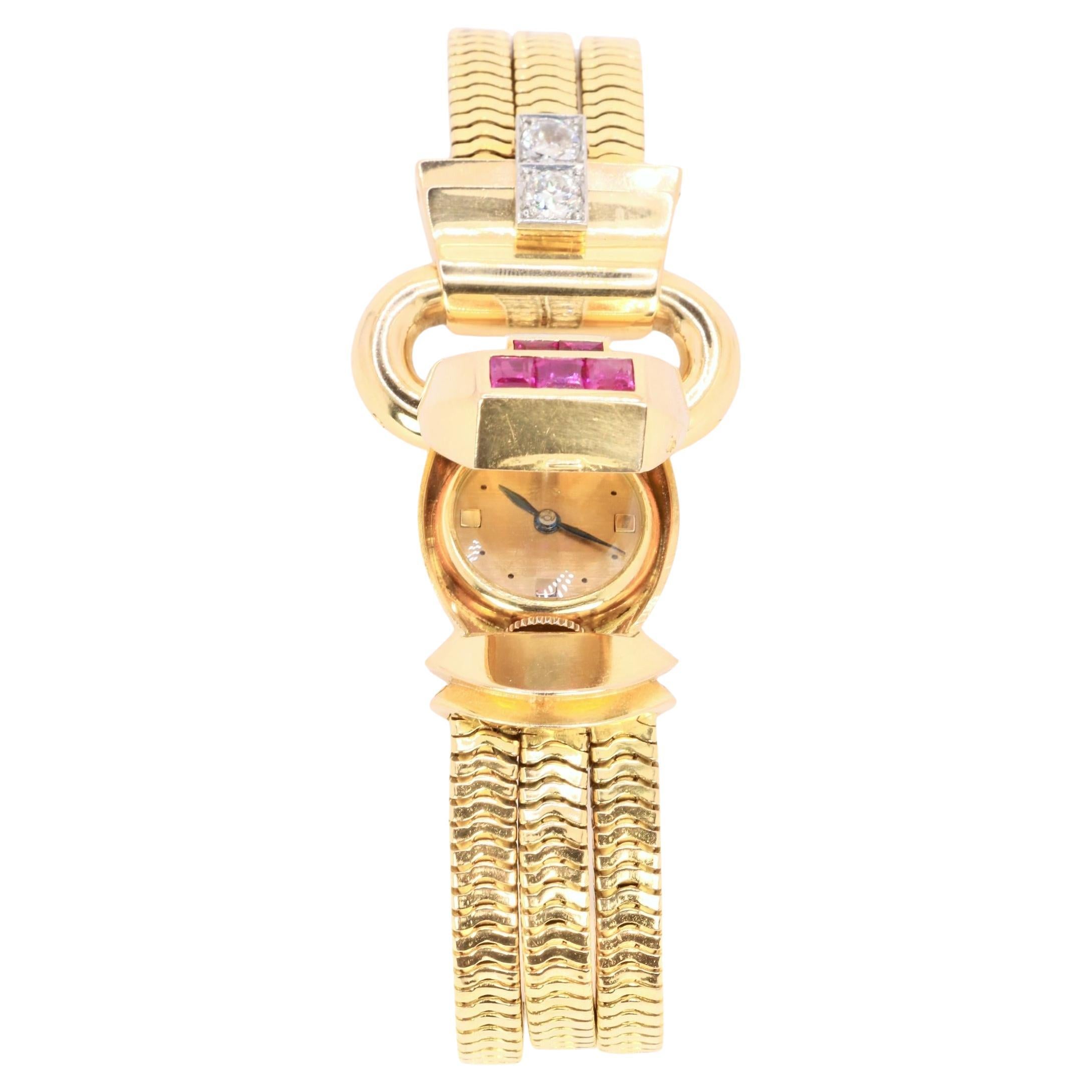 UTI - Geheime Uhr aus Gold, Diamanten und kalibrierten Rubinen im Angebot