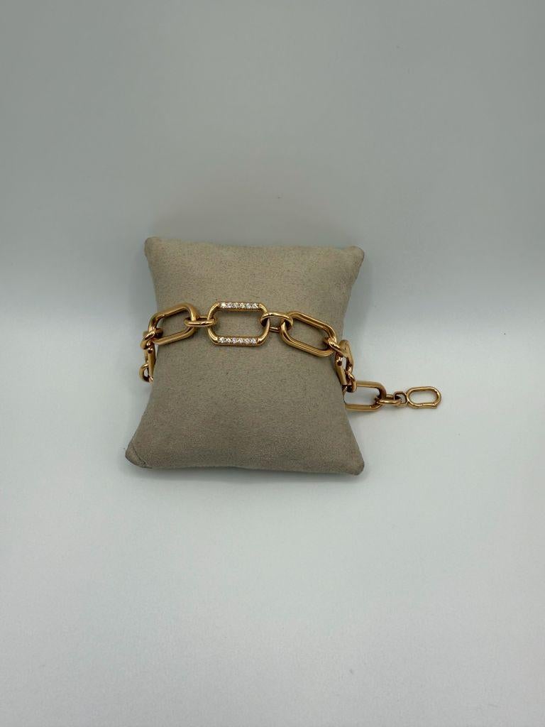 The Utopia  Aurum 18kt Rose Gold Bracelet is a refined and sophisticated piece that exudes modern elegance. Crafted from high-quality 18kt rose gold, the bracelet's warm, pinkish hue creates a soft, radiant glow, highlighting the luxurious design.