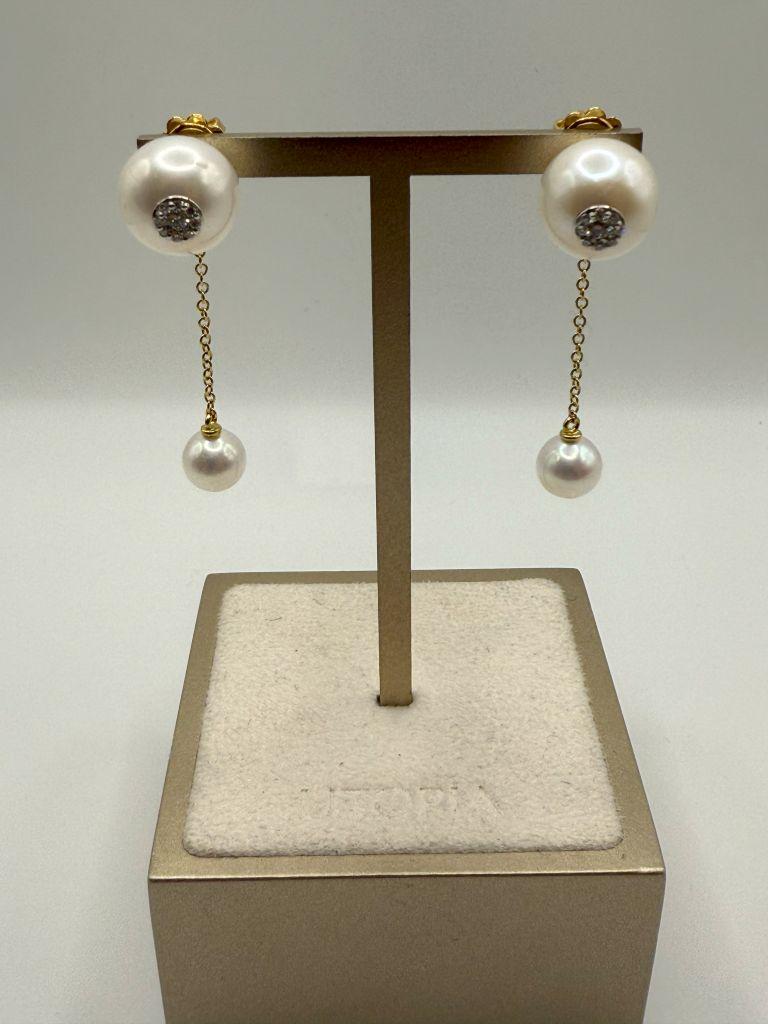 The Utopia Dots earrings are a striking embodiment of contemporary elegance and timeless luxury. Crafted in 18kt yellow gold, these earrings feature a unique and modern design, with delicate dots of gold adding texture and visual interest to the