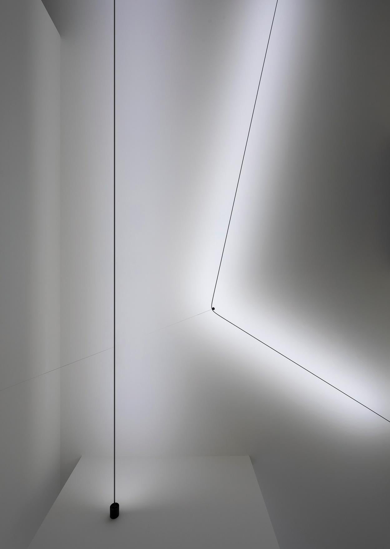 Utopia is a project on the limit state of light, the research for the minimum
dimension necessary for pure and essential lighting.
It represents full flexibility, in both its design and its light control.
The light strip reaches into space, bending,
