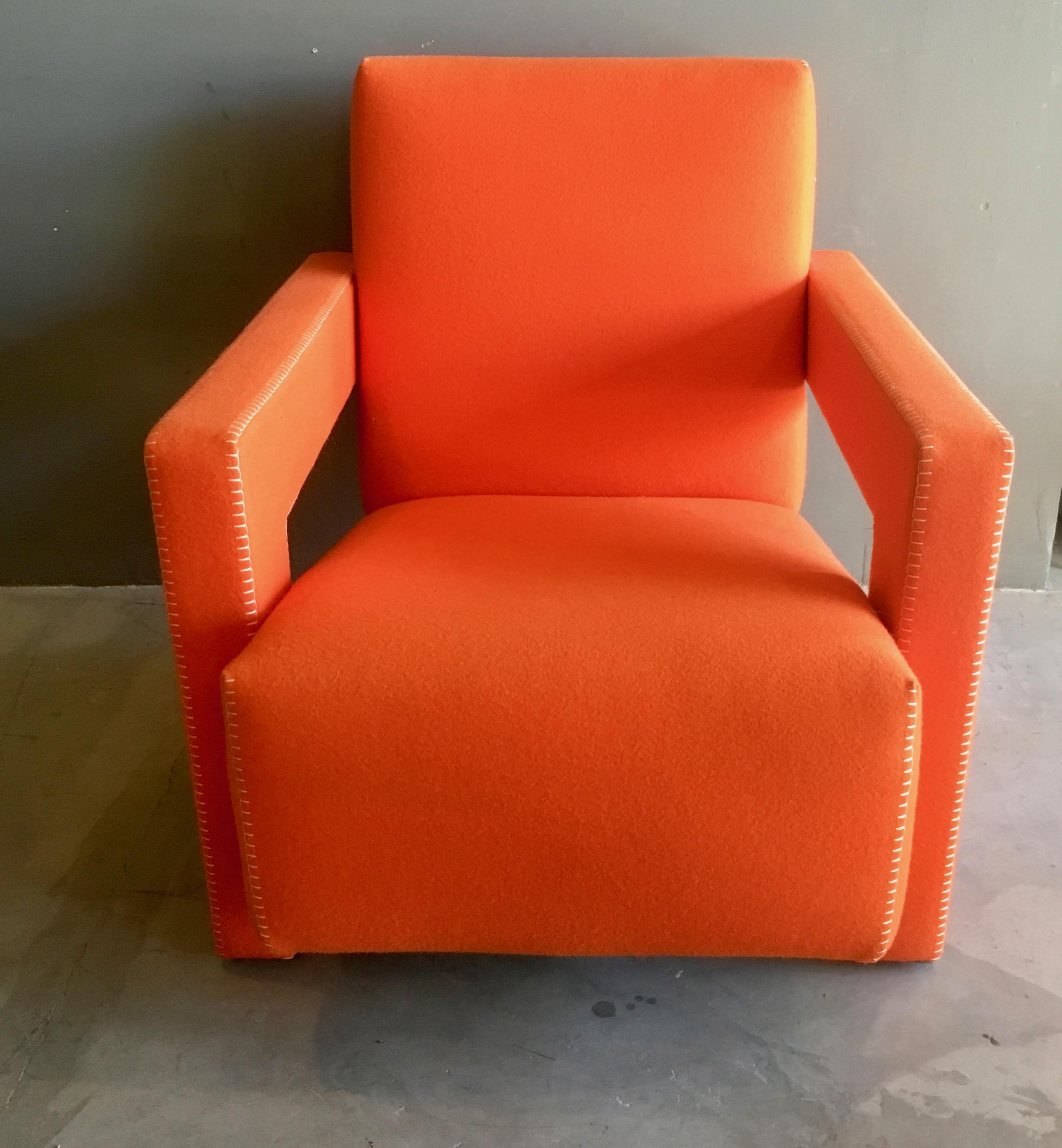 Gorgeous armchair designed by Gerrit Thomas Rietveld. Manufactured by Cassina with original label. Color is similar to Hermes orange. Very good condition. Extremely comfortable.