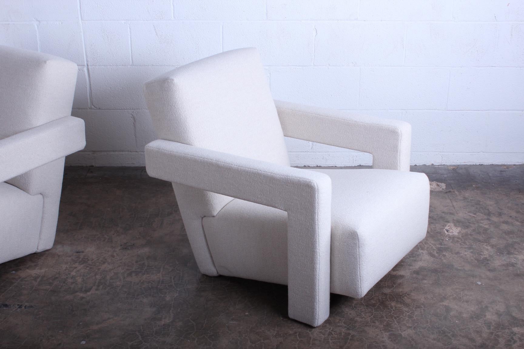A pair of Utrecht lounge chairs designed by Gerrit Rietveld and produced by Cassina, 1980s. Fully restored and upholstered in a boucle fabric.
