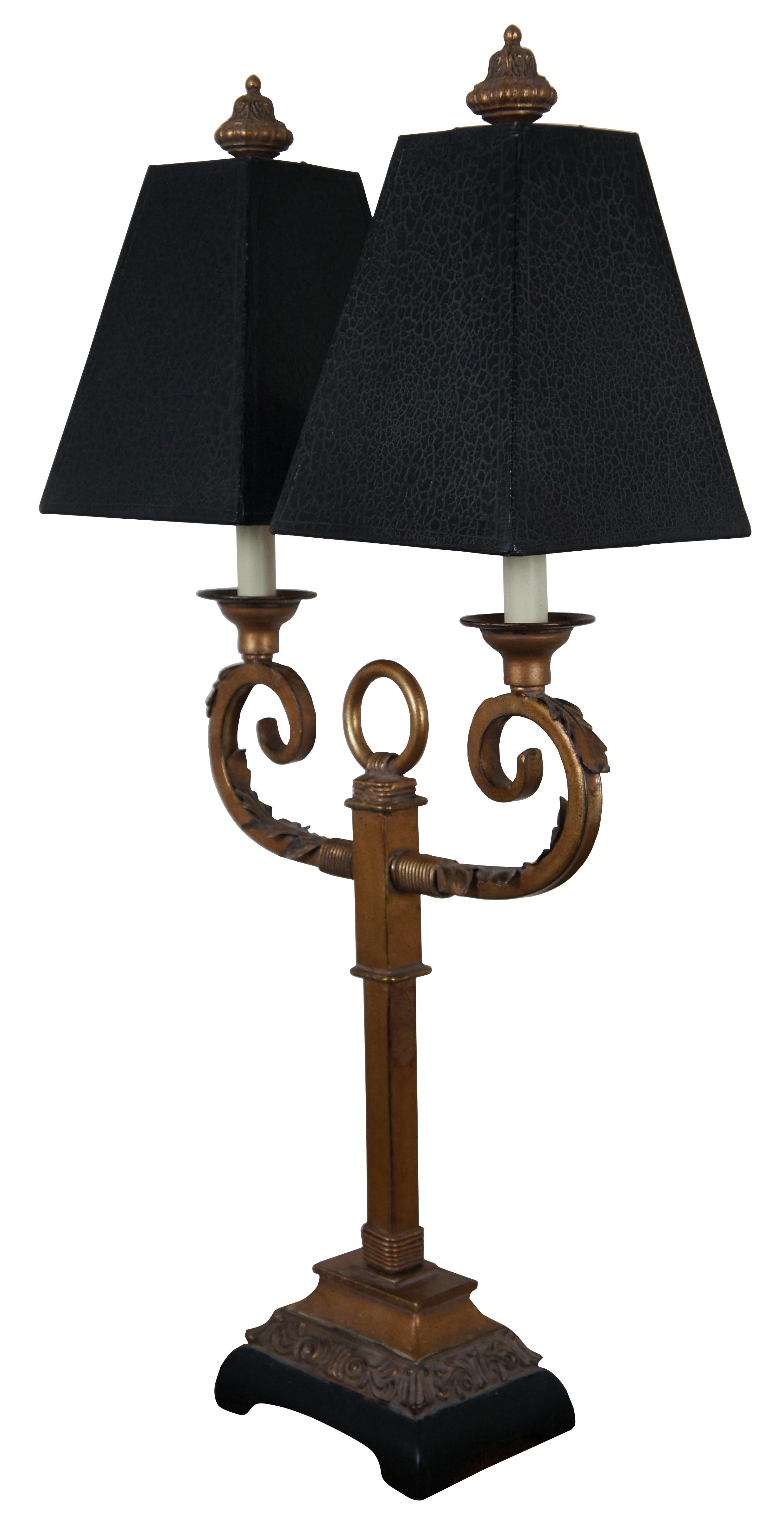 Vintage Uttermost black and gold French style candelabra table lamp with two candle or candlestick lights and double black crackle finish shades. Measure: 34