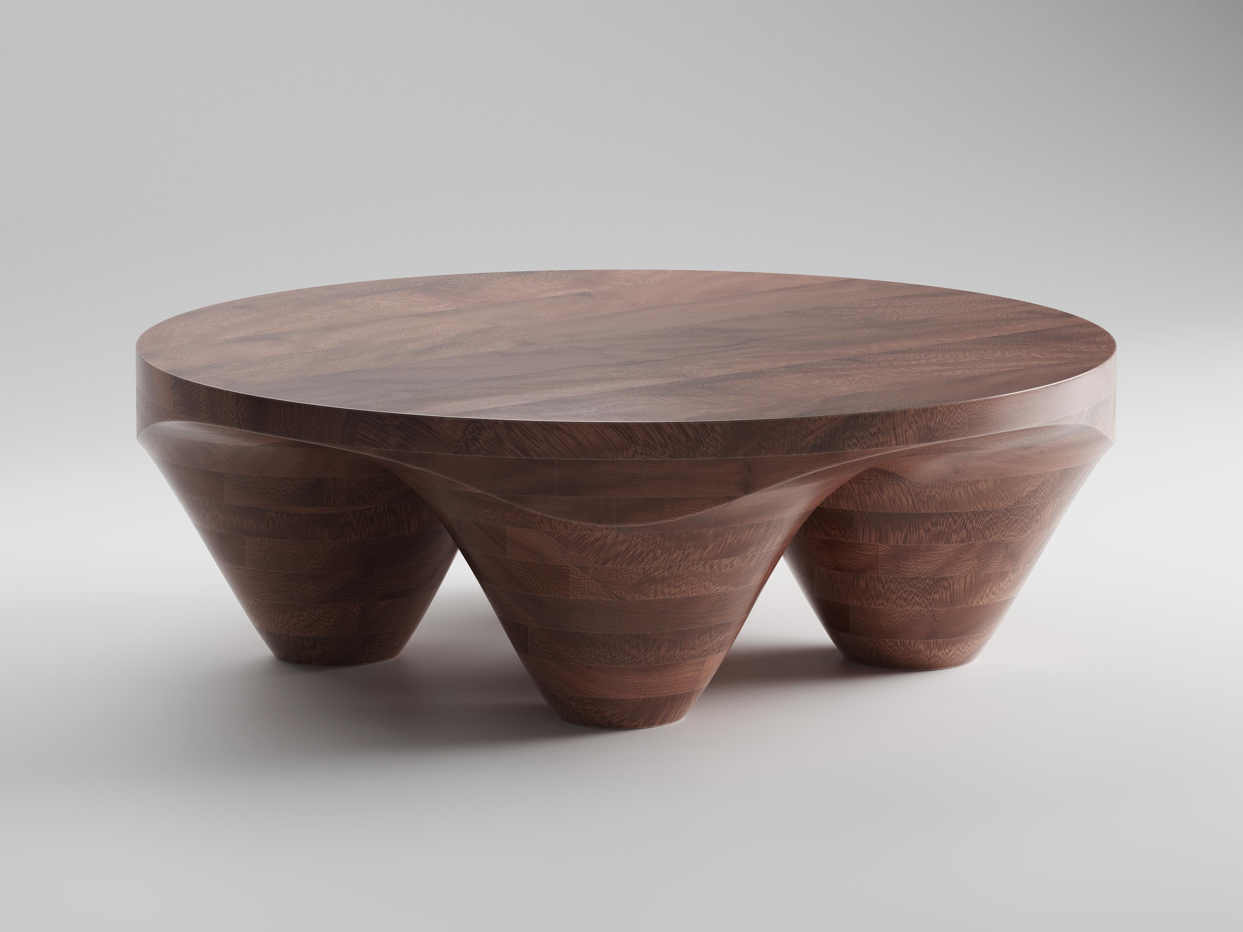 Utterö Mahogany Coffee Table by Studio TOOJ
Designed by Johan Wilén
Dimensions: D 110 x H 36 cm.
Materials: Mahogany wood.

Also available in walnut. Please contact us.

A true testament to the designer’s signature style, redefining what we