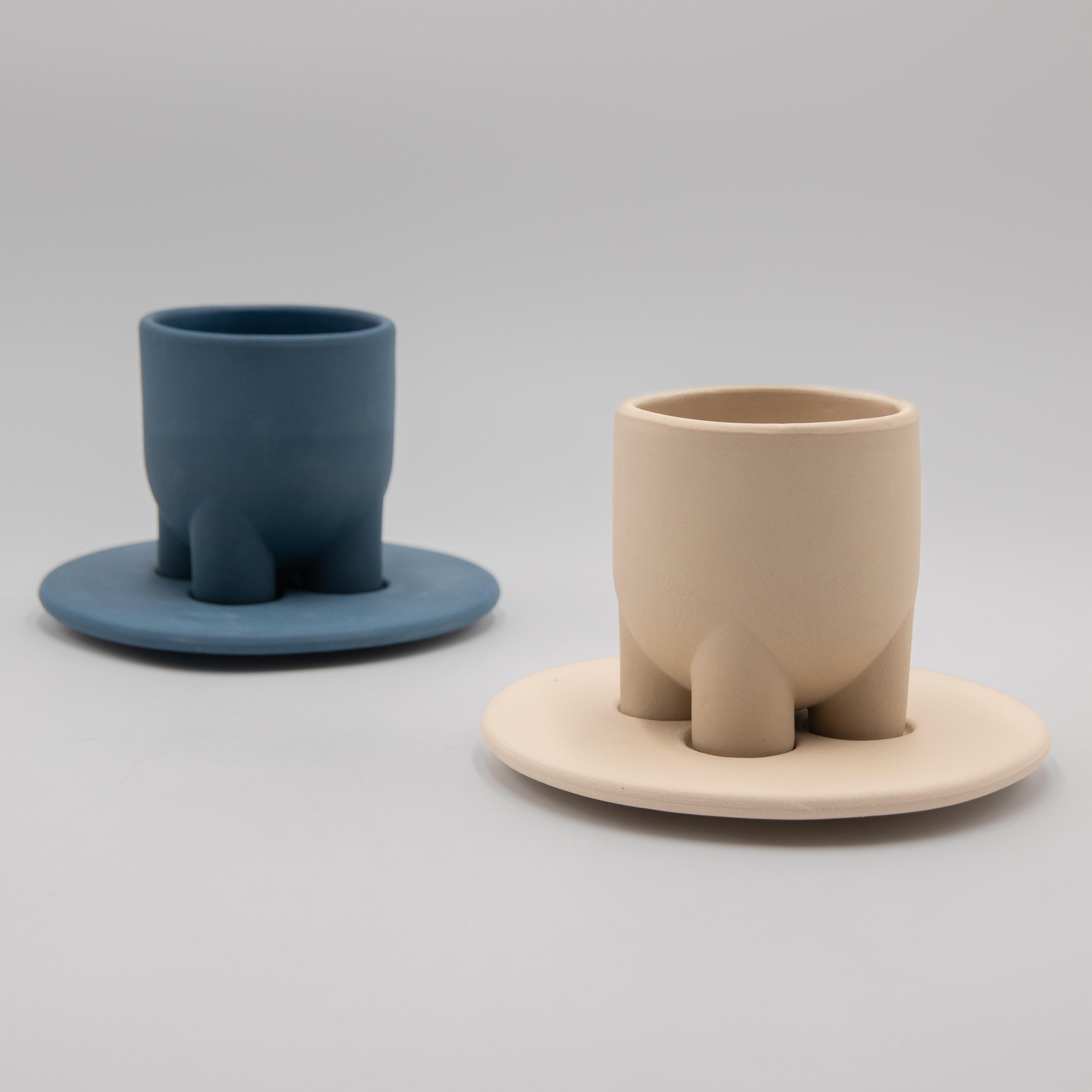 A modern coffee cup and saucer set design drawing inspiration from the coffee traditions of Italy and Iran. Simple geometric shapes, clean lines and a truly unique design make UUUUcio the perfect vessel for daily use and a decorative object.