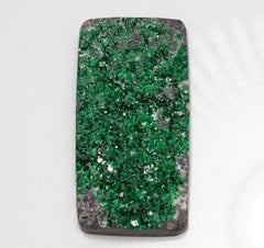 Uvarovite green garnet cabochon