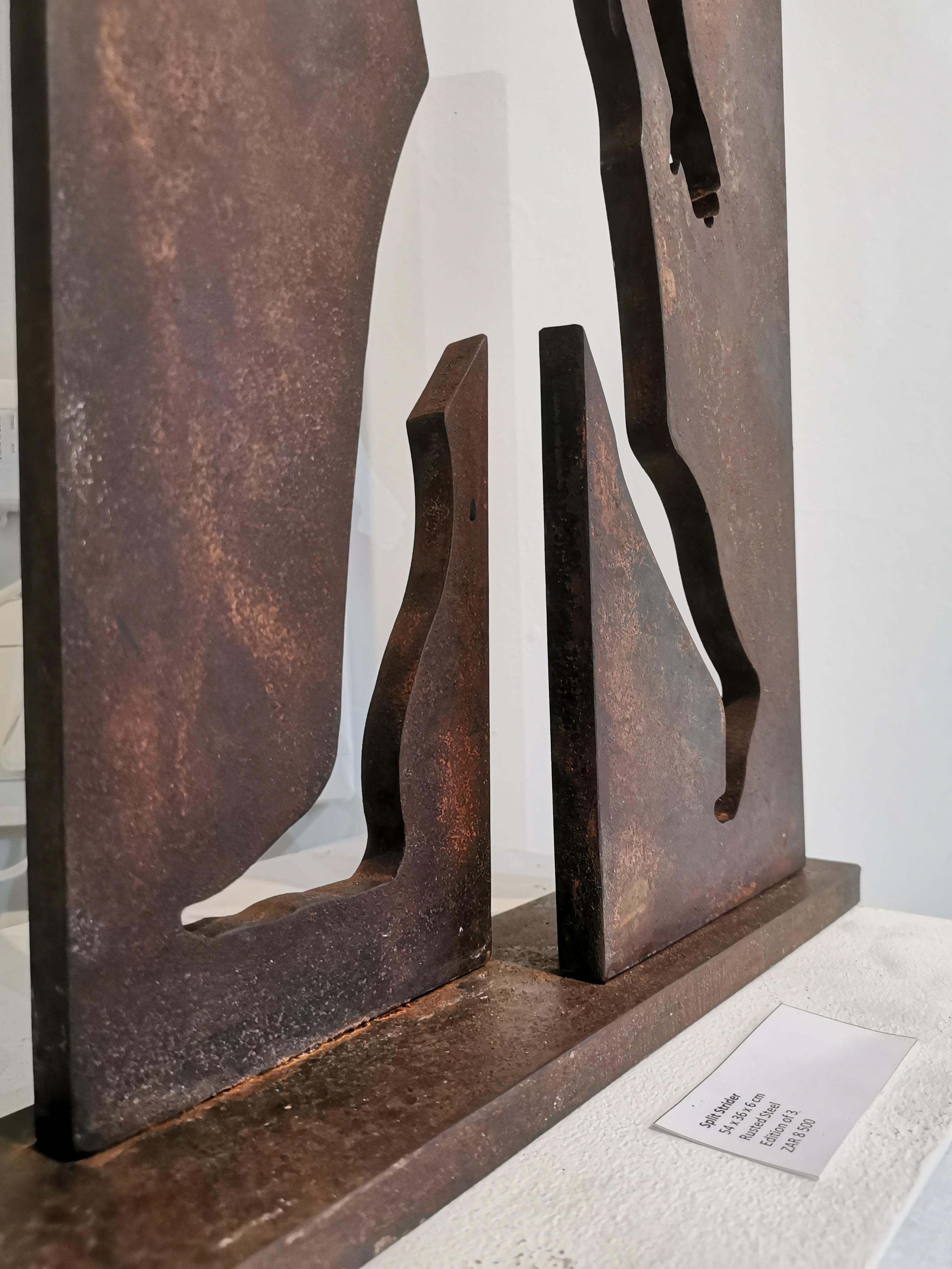 A medium sized, limited edition, abstracted figurative rusted steel sculpture on rusted steel base.  Edition 1/3. 