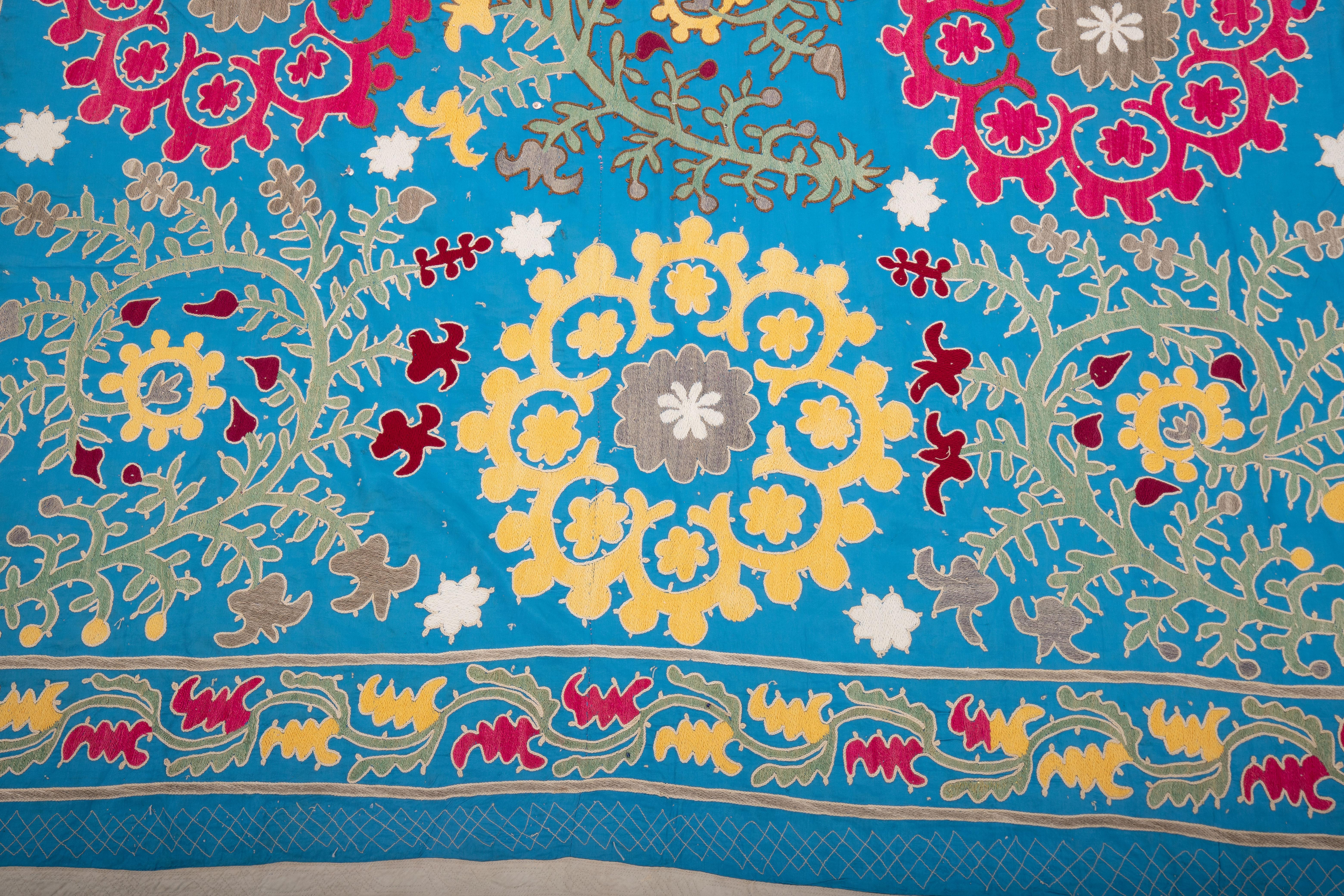 Embroidered Uzbek Blue Suzani, cotton on Rayon background fabric, mid 20th C. For Sale