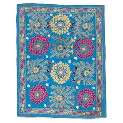 Vintage Uzbek Blue Suzani, cotton on Rayon background fabric, mid 20th C.