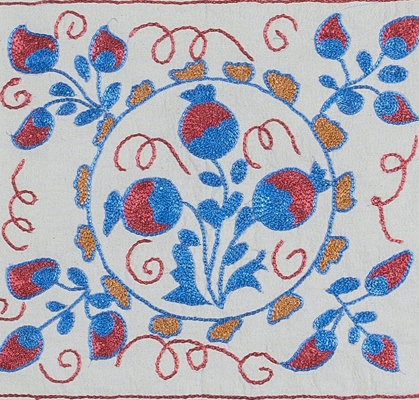 Decorative cushion cover made of hand embroidery silk on linen background, flowers and vine motifs, linen backing with zipper, no insert.
Delicate and specialised washing advised.

Suzani, a Central Asian term for a specific type of needlework,