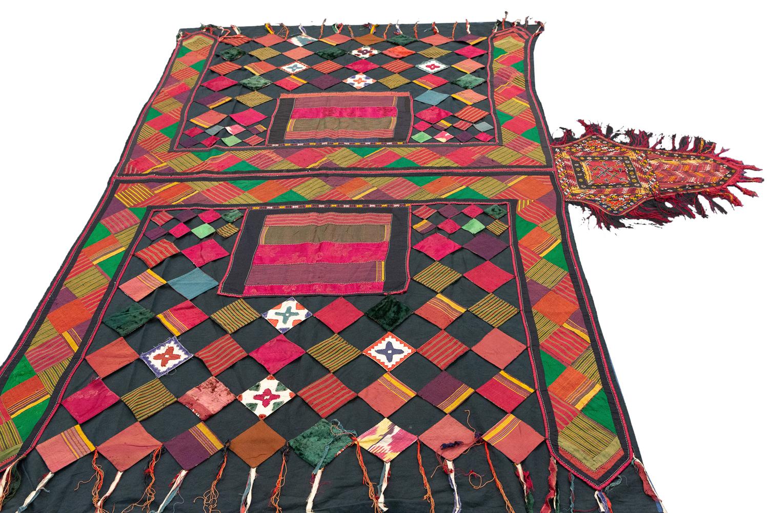 This is an antique Uzbek suzani horse cover woven during the end of the 19th century that 
Measures 160x150 in size. This piece was made using parts from different wool and silk textiles 
are woven onto the black base. This piece would have been