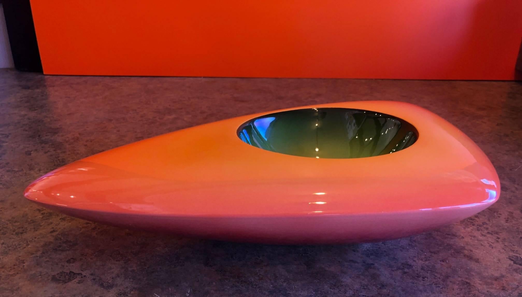 Vibrant model V-33 triangular earthenware bowl by California, artist Fred Stodder. The piece is signed and is 17.5