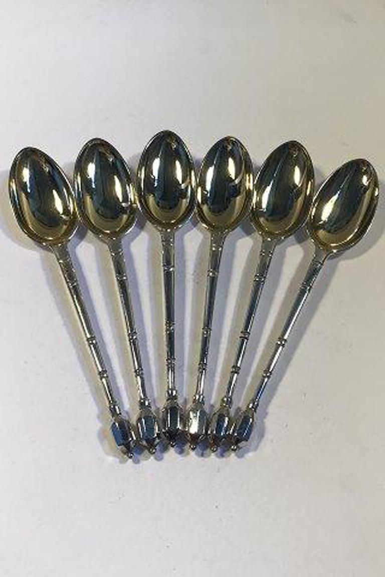 V. Christensen silver set of 6 coffee spoons 

Measures 11 cm (4 21/64 in) gilt bowl original box 1893 - 1910.
 