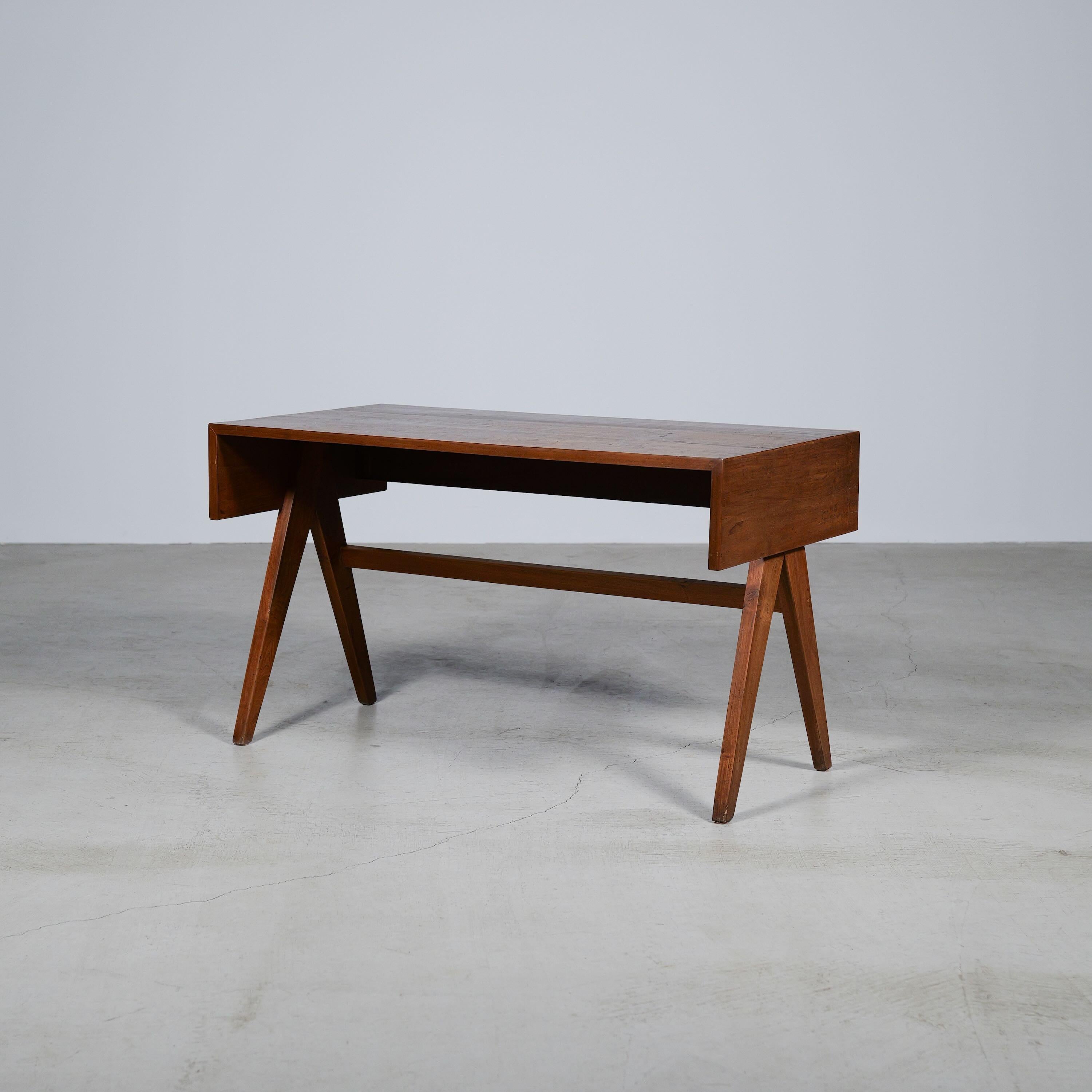 An authentic mid-century piece from Pierre Jeanneret’s legendary Chandigarh commission. Crafted in teak wood.