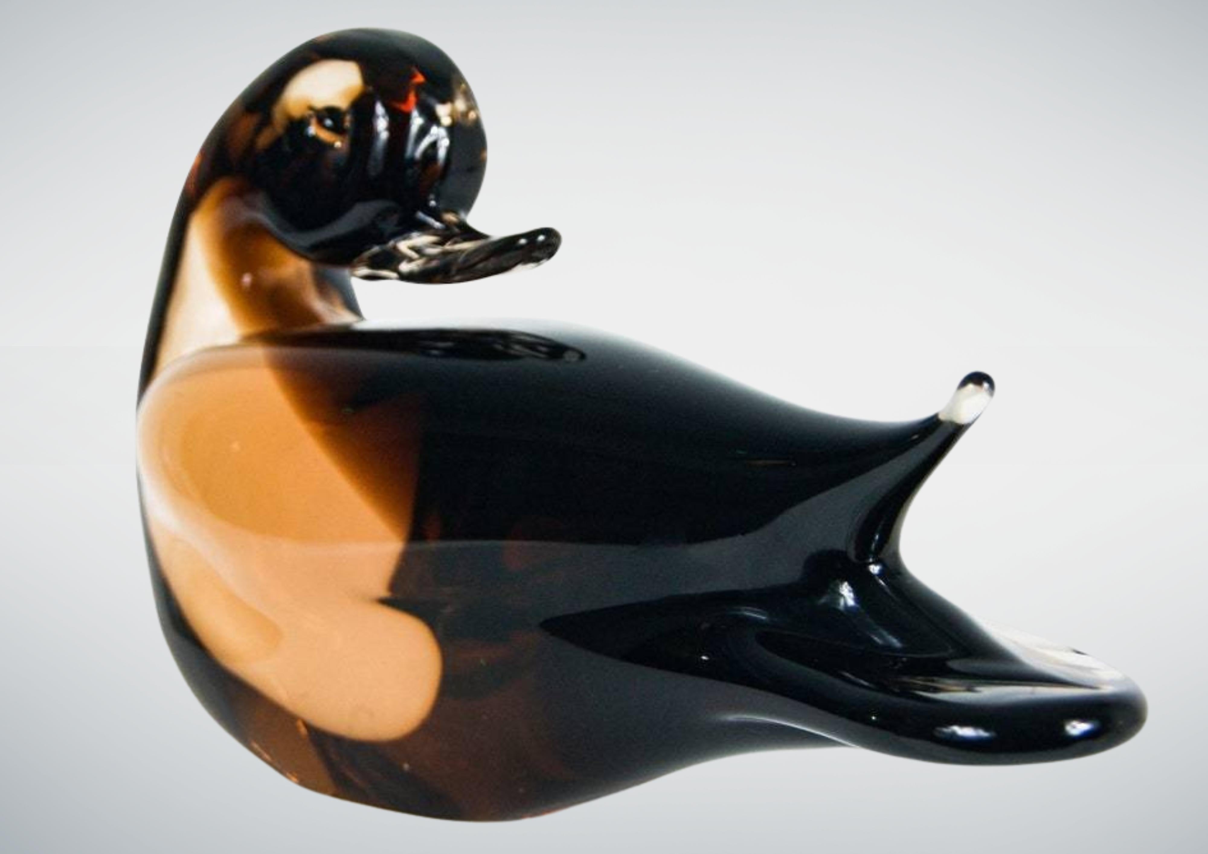 Monumental chunky glass duck by V Nason & Co Murano.
Solid amber glass duck sculpture weighing approximately 3.5kg prepackaged.
Still retains its original silver foil label.
No damage.