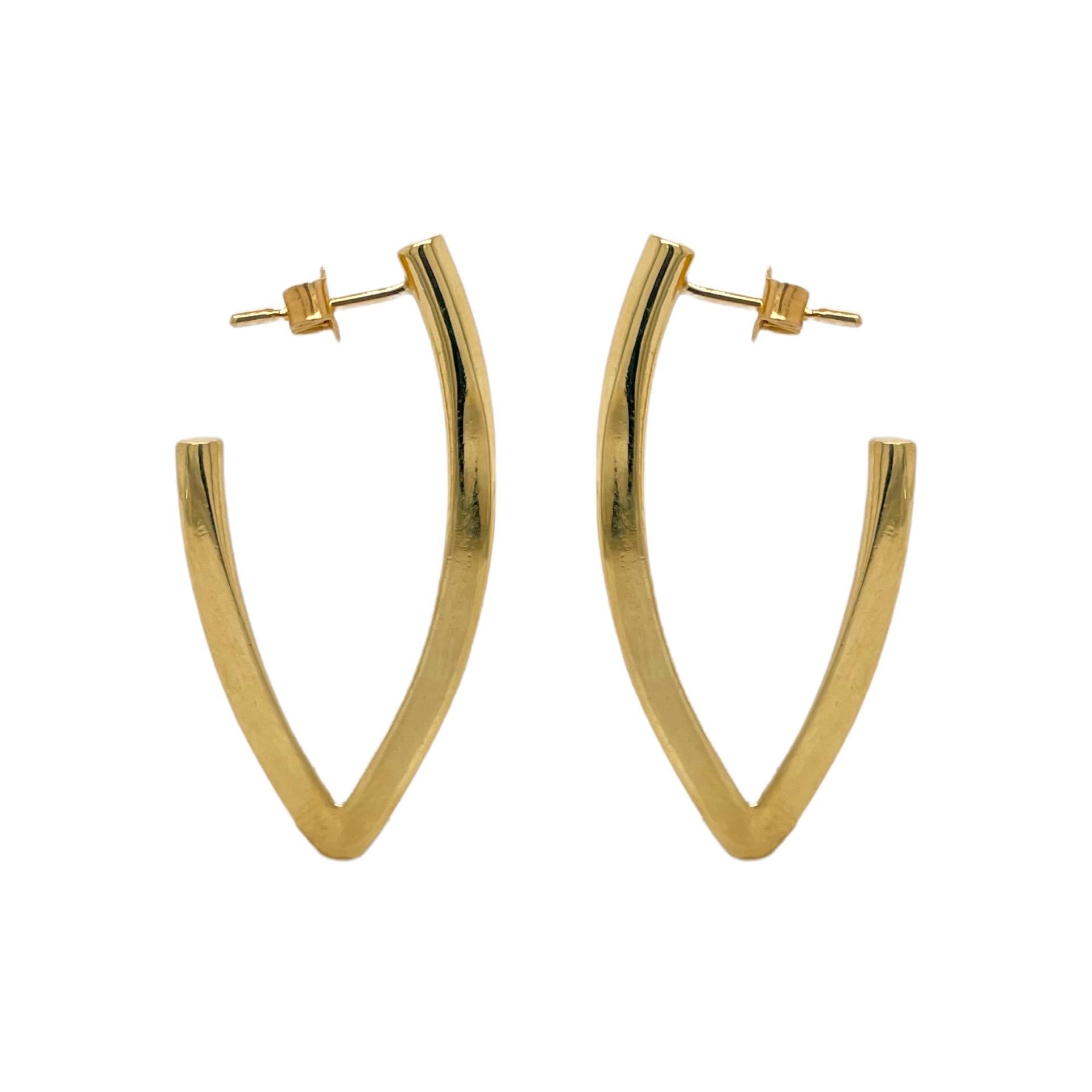 V-Shape hoop earring measures approximately 1.5'' in length and contains a post closure. Earring is created in solid 18k yellow gold and weighs 8.6 grams.  

All of our pieces are packaged carefully and accompanied by a Pico pouch to keep your
