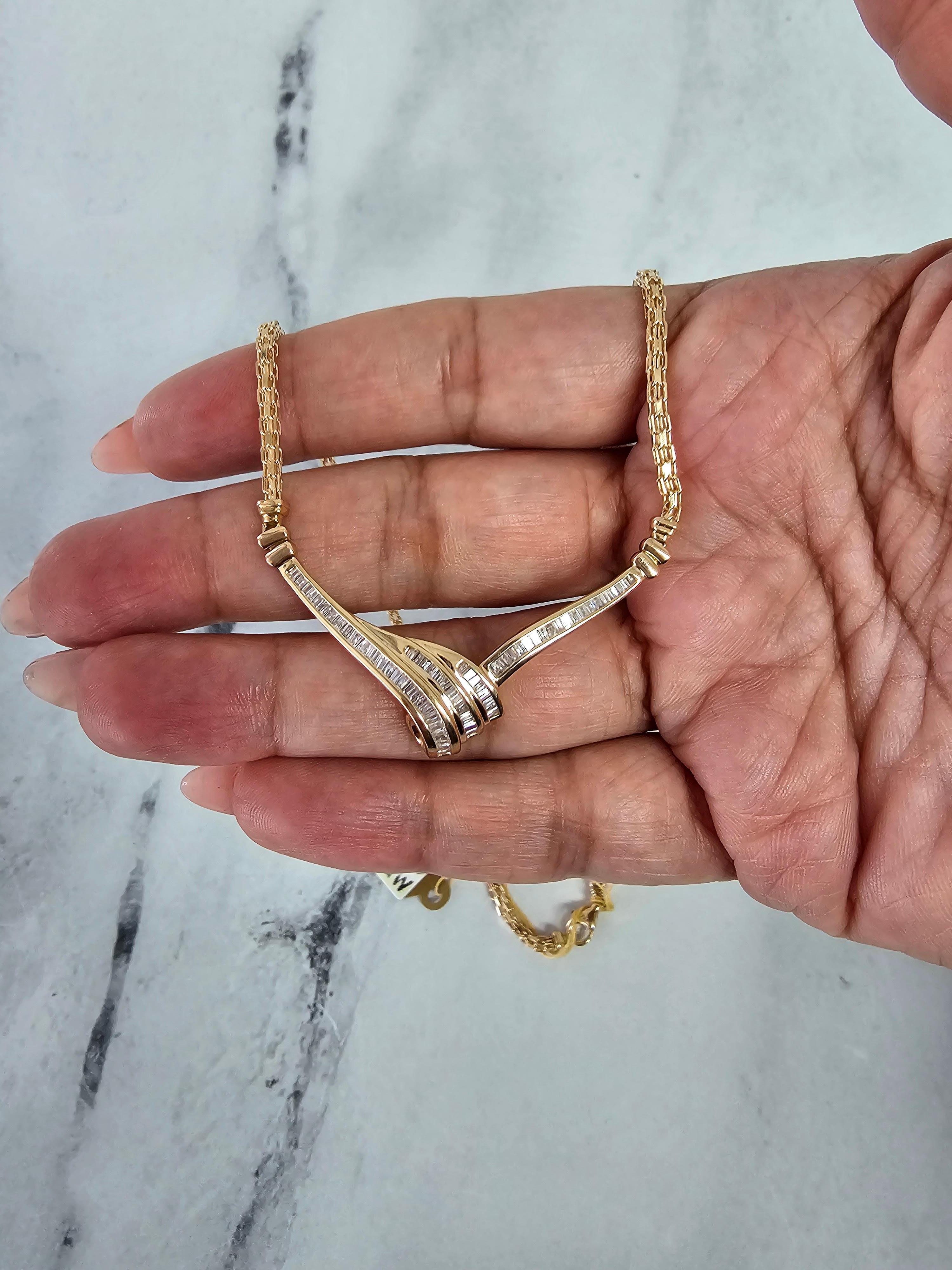 ♥ Product Summary ♥

Main Stone: Diamond
Approx. Carat Weight: .96cttw
Diamond Color: H/I
Diamond Clarity: SI2/SI3
Stone Cut: Baguette  
Material: 14k Yellow Gold
Dimensions: 30mm x 50mm
Chain: Wheat Chain
Weight: 13 grams
Length: 16 inches