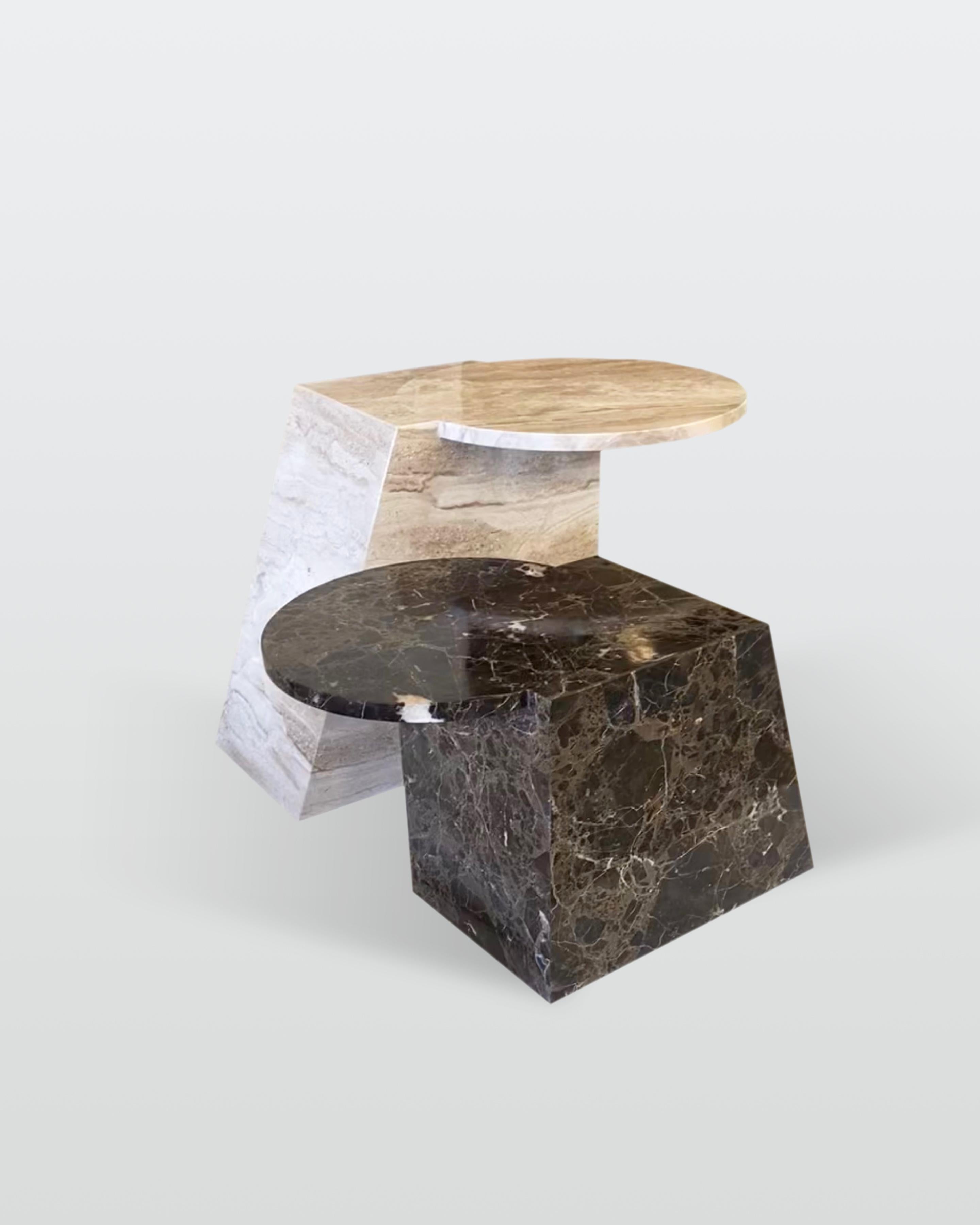 Ellements of art and architecture are combined in the design of the V tables without foregoing functionality.  The two pieces can be juxtaposed in various ways to suit the mood that you want to create.

The V tables are available in marble or in