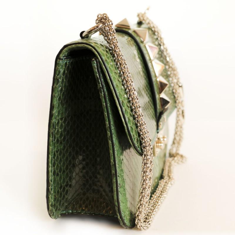 Beautiful and rare VALENTINO GARAVANI “Vavavoom” python bag

Condition: very good
Made in Italy
Material : exotic python leather 
Interior : beige canvas
Color : Grass green
Dimensions: 27 x 17 x 8 cm
Shoulder strap: 170 cm
Hardware : pale gold