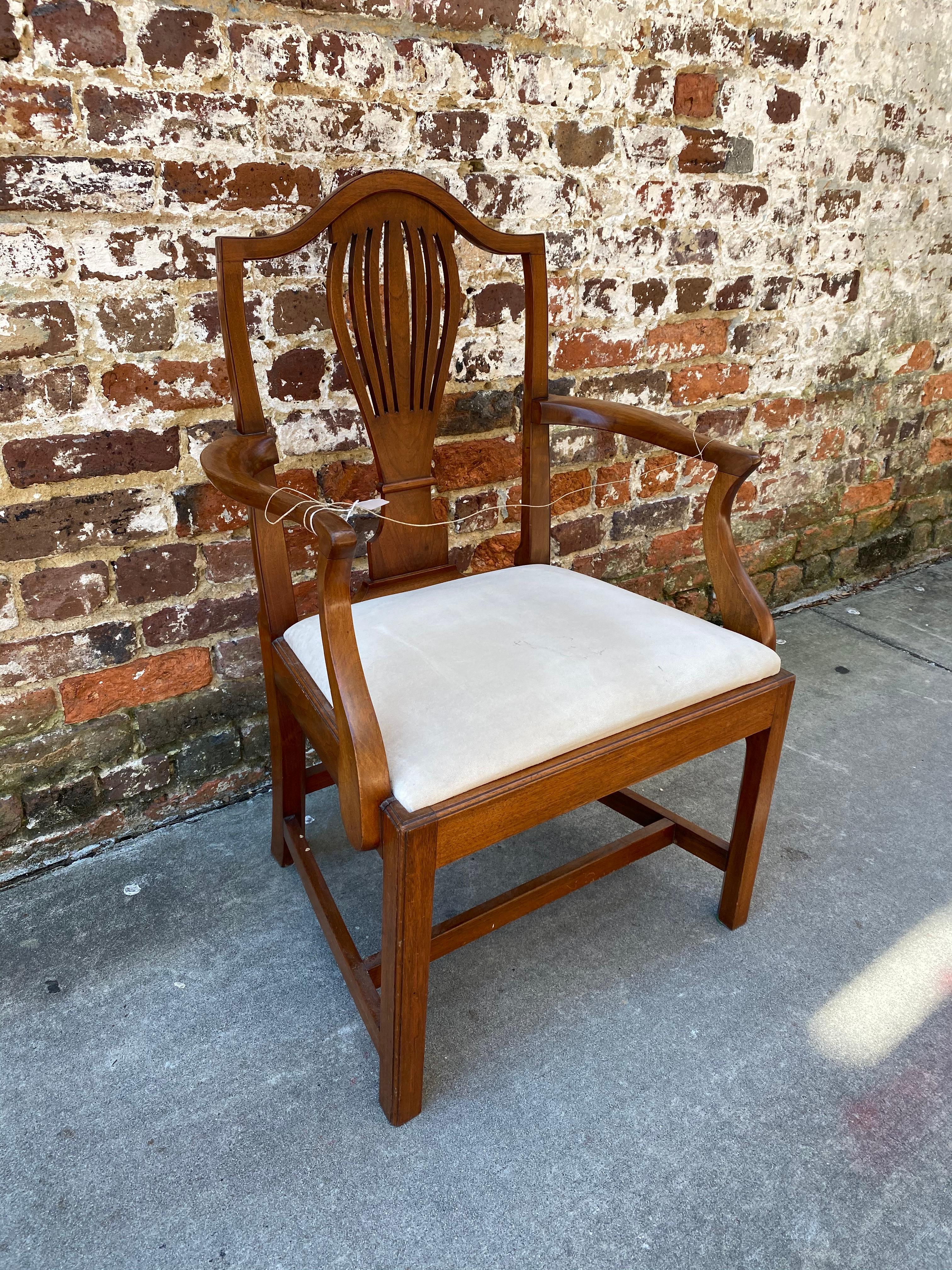 Va walnut armchair with slip seat.