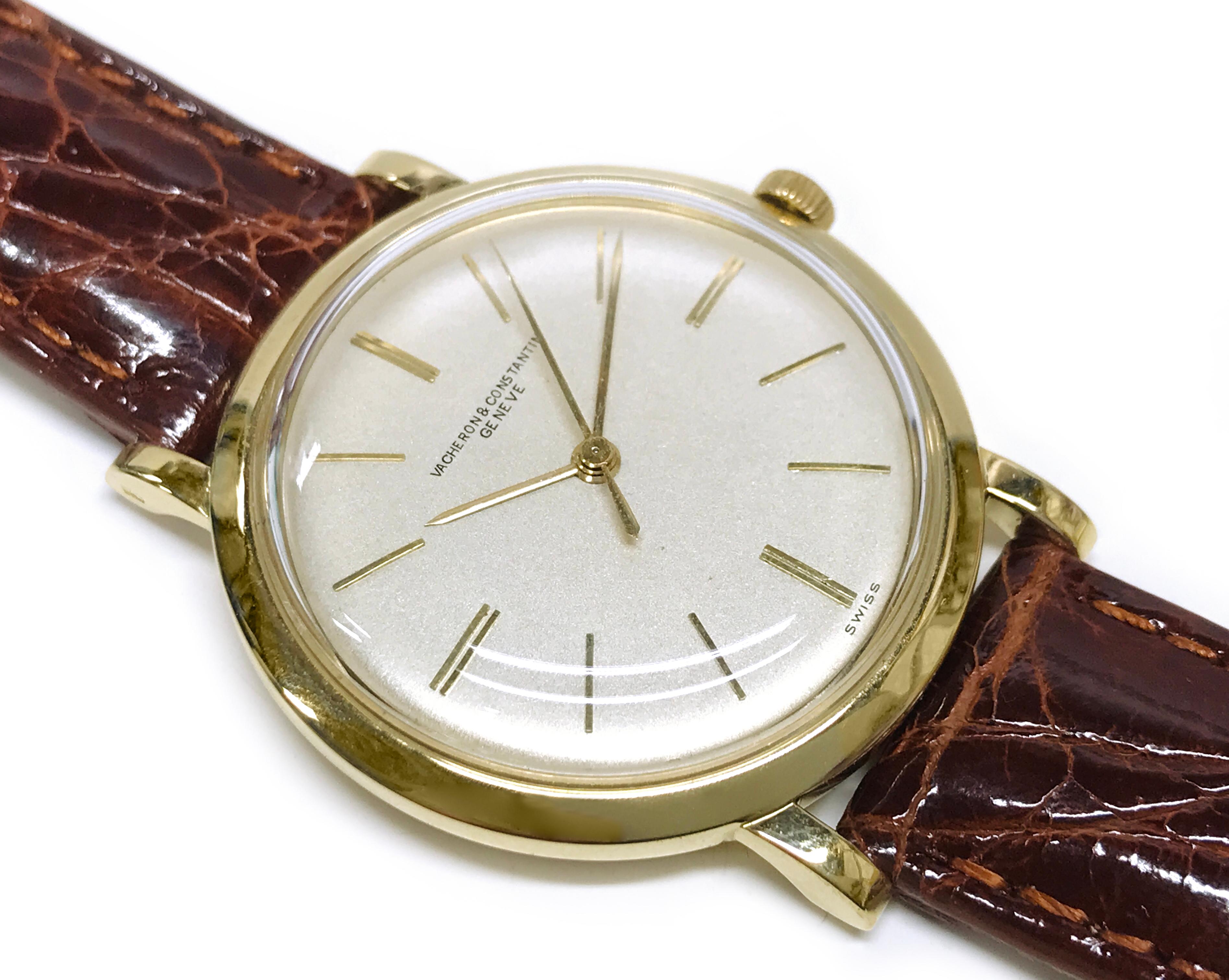 Vacheron & Constantin, 18 Karat Men's Manual Watch, 1957. The watch has a 5 Jewel Movement #VC 1002. The case number is 355838, serial #530703. The watch has a silver dial, gold hour and minute hands, and manual wind movement. On the back of the
