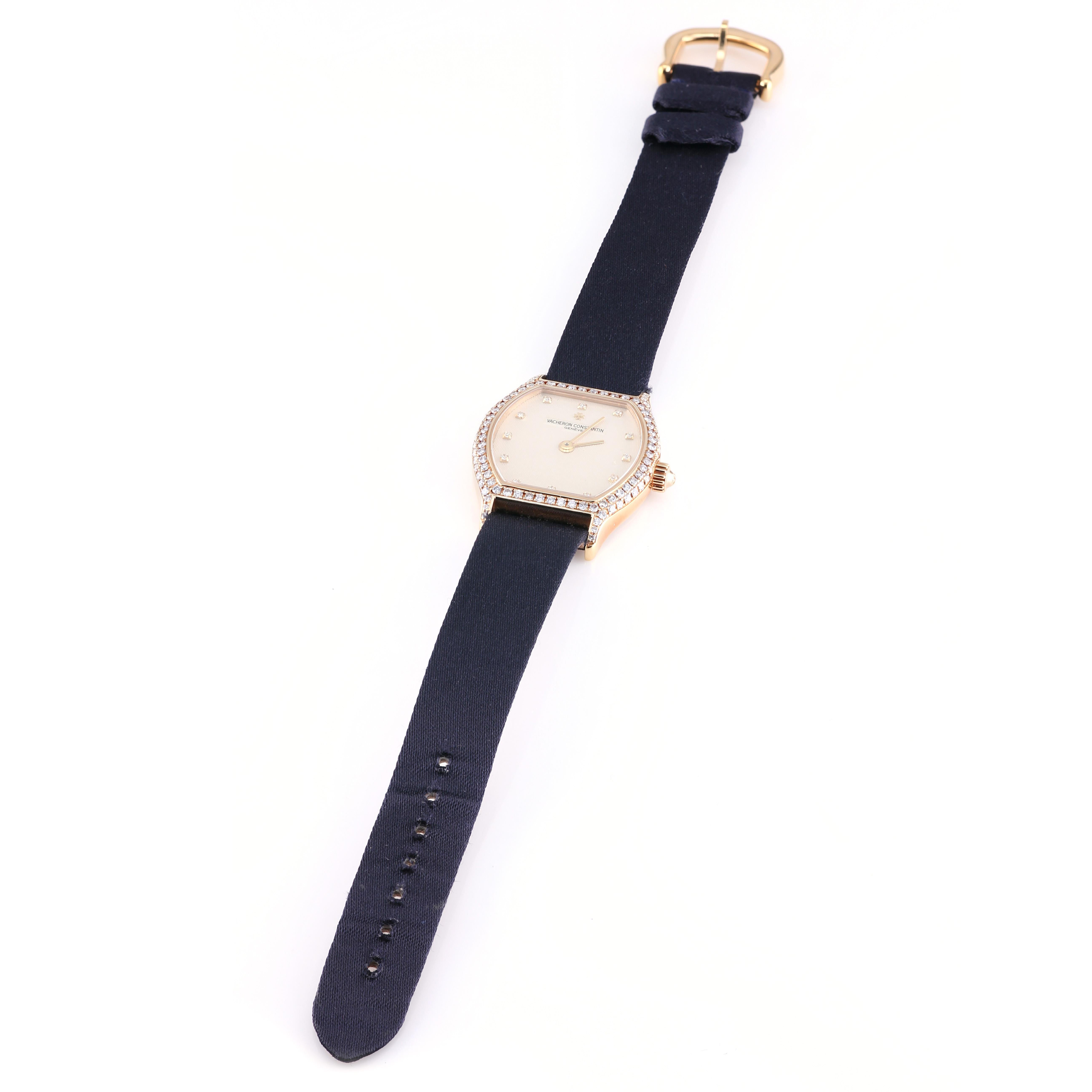 A true jewel of a watch, this Vacheron Constantin ref. 661407.
The elegantly tonneau-shaped and modestly sized case is executed in 18K yellow gold and embellished with factory-set diamonds. The theme is continued on the beautifully guilloché dial,