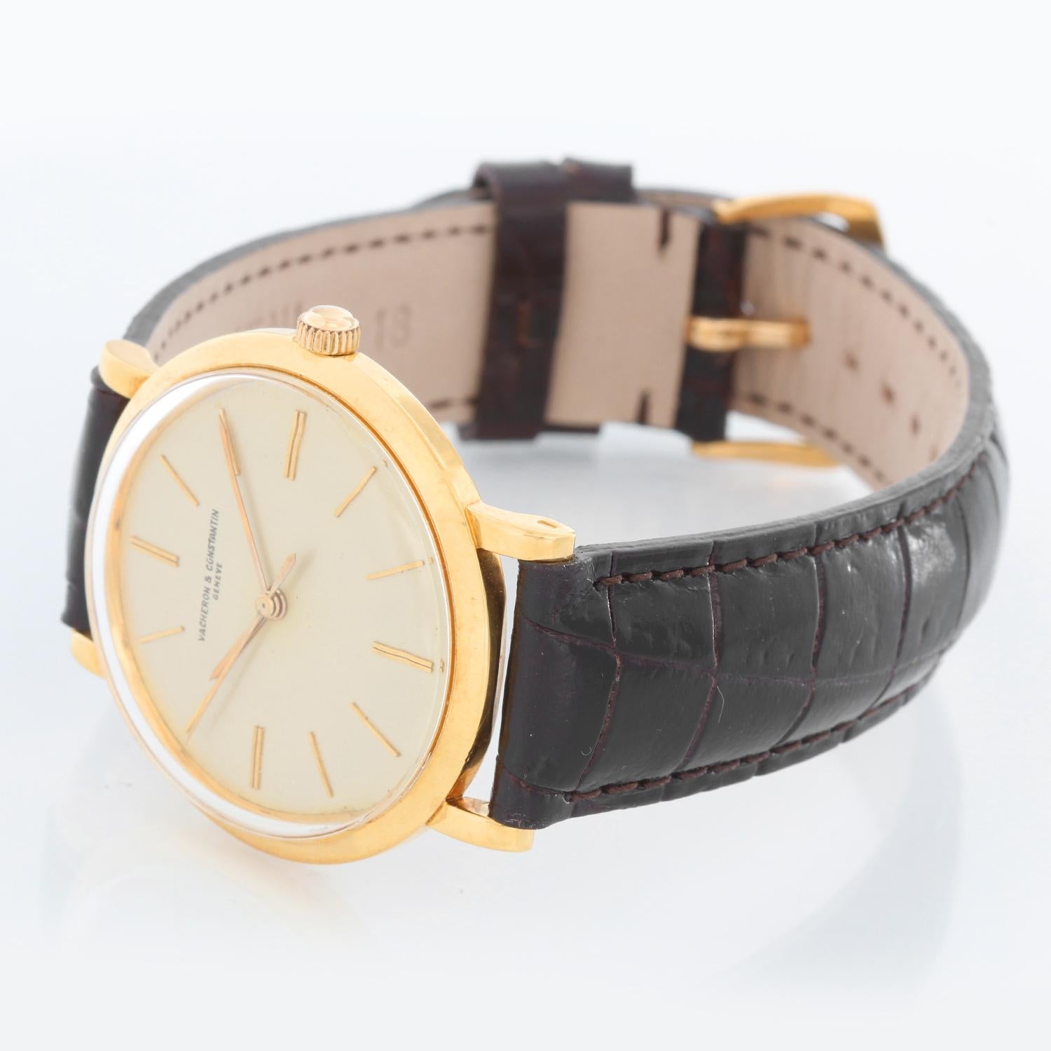 Vacheron Constantin 18K Yellow Gold Men's Manual  Watch - Manual winding. Yellow Gold case ( 34 mm ). Silver dial with stick hour markers. Brown strap band with 18K Yellow gold tang buckle . Pre-owned with original decorated leather box, certificate