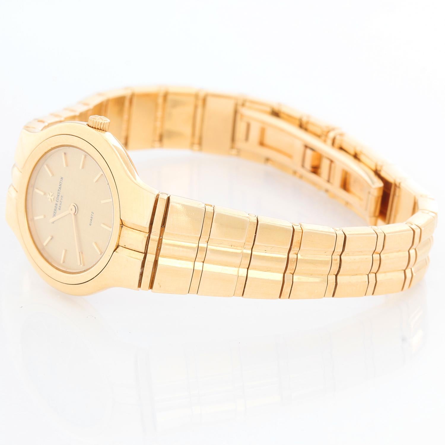 Vacheron Constantin 18K Yellow Gold Phidas Ladies Watch  - Quartz. 18K Yellow gold with smooth bezel ( 24 mm) . Champagne textured dial with stick hour markers . 18K Yellow gold link bracelet; will fit a 6.25 inch wrist . Pre-owned with custom box .