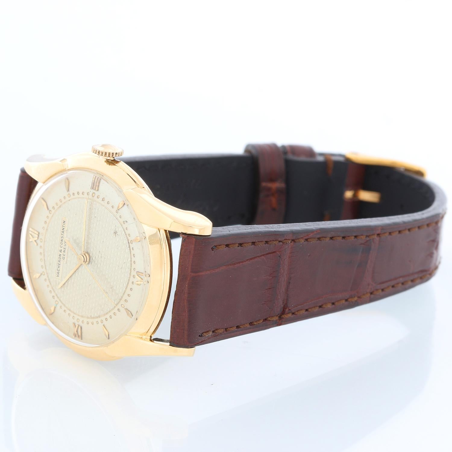 Vacheron Constantin 18K Yellow Gold  Vintage Men's Watch - Manual winding . 18K  Yellow gold ( 33 mm ) . Silver dial with guilloche middle . Brown strap band with buckle . Pre-owned with custom box.