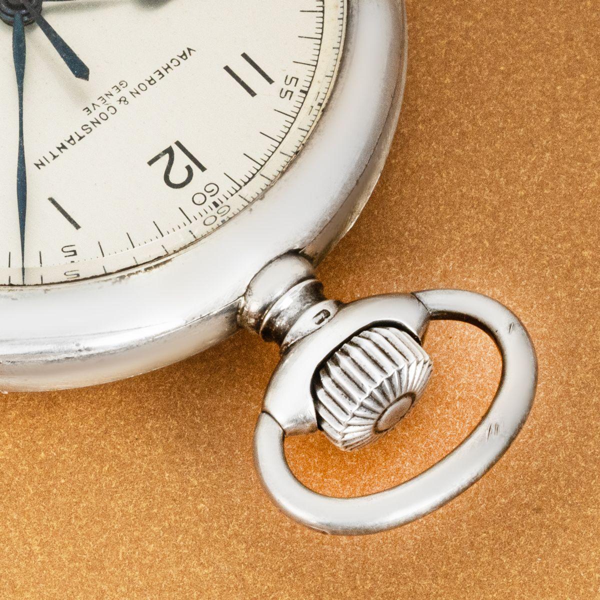 Vacheron & Constantin Genève. A Heavy Silver keyless Lever Open Face Military Deck Watch with its Original Wooden Deck Box, C1940s.


Dial: The Matt Silver dial signed Vacheron & Constantin Geneve with bold Arabic numeral outer minute track with