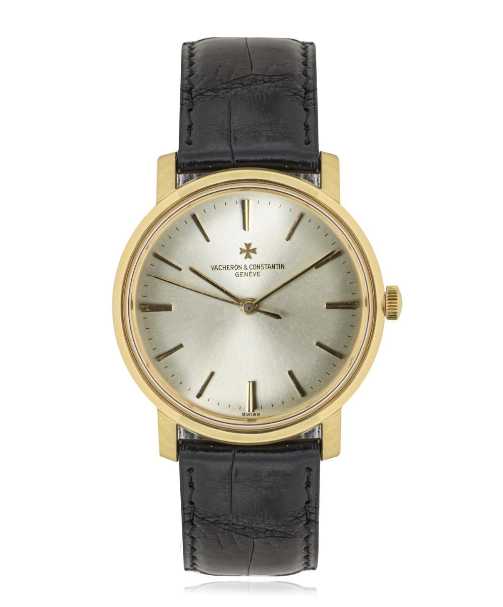A mens 34mm Classique in yellow by Vacheron Constantin. Features a champagne dial with applied hour markers and a fixed yellow gold bezel. Fitted with plastic glass and powered by a manual winding movement. Equipped with a generic leather strap and