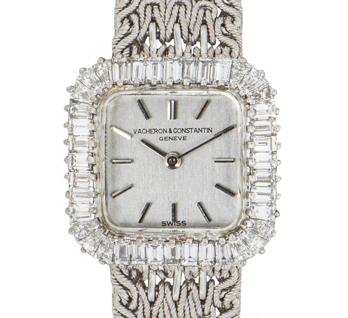 A stunning 20mm white gold cocktail watch by Vacheron Constantin. Featuring a distinctive silver dial with applied hour markers and a fixed white gold bezel set with 40 diamond baguettes weighing 2.02ct. Fitted with a plastic glass, a manual wind