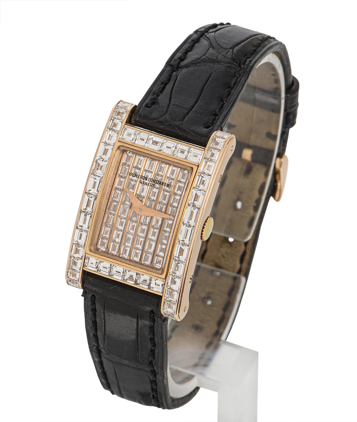 A 20 mm rose gold Kalla Rome by Vacheron Constantin, featuring a dial with set with 48 baguette-cut diamonds. The bezel is also set with 48 baguette-cut diamonds. An original black leather strap comes with an original rose gold pin buckle that is