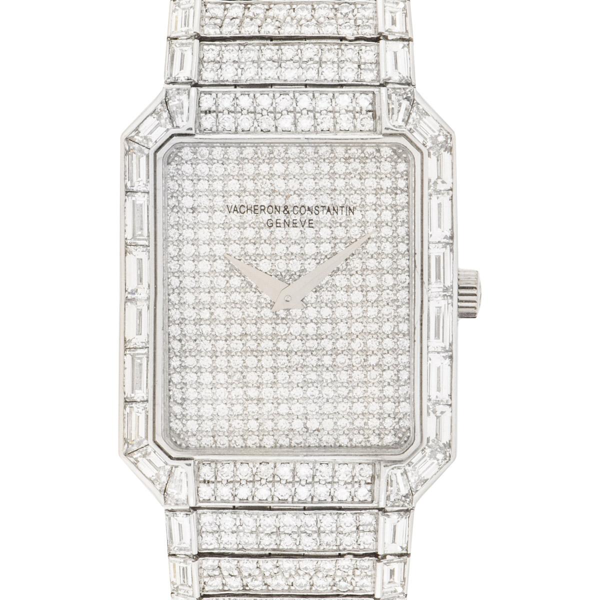 A Platinum Kalla Sovereign Fully Loaded Gents Wristwatch, pave set diamond dial, a fixed platinum bezel set with 20 baguette cut diamonds (~3.00ct) and 36 round brilliant cut diamonds (~2.16ct), a platinum bracelet set with 78 baguette cut diamonds
