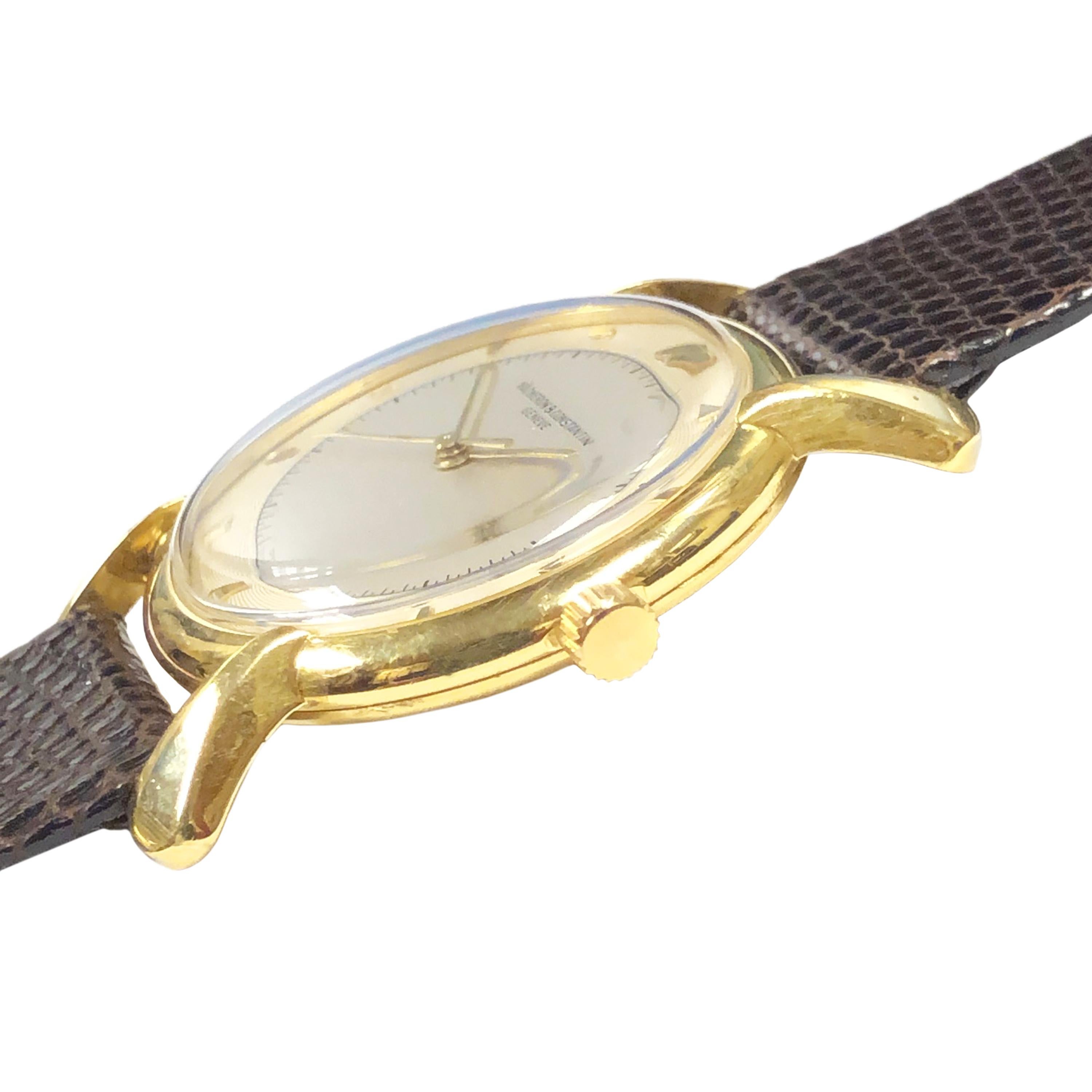 Circa late 1940s Vacheron & Constantin Wrist Watch, 33 MM 18K Yellow Gold 2 Piece Case with Eccentric Flared Lugs. 17 Jewel caliber 1002 Mechanical, Manual wind Movement. Engine Turned stepped silver Dial with raised Gold Markers and a sweep seconds