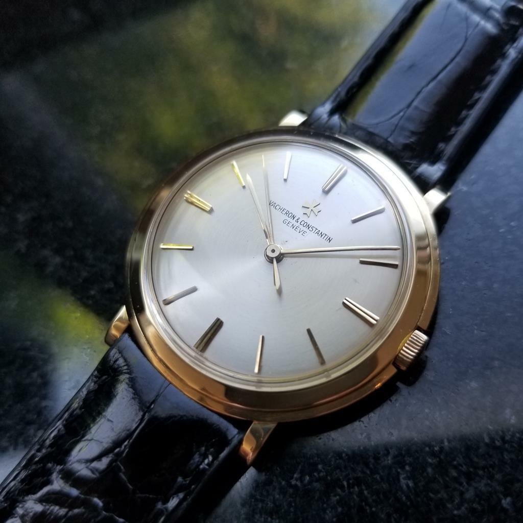 Timeless luxury, men's 18K solid gold Vacheron & Constantin 4986 manual hand-wind dress watch, c.1950s. Verified authentic by a master watchmaker. Gorgeous silver Vacheron & Constantin dial, applied gold baton hour markers, gold minute and hour