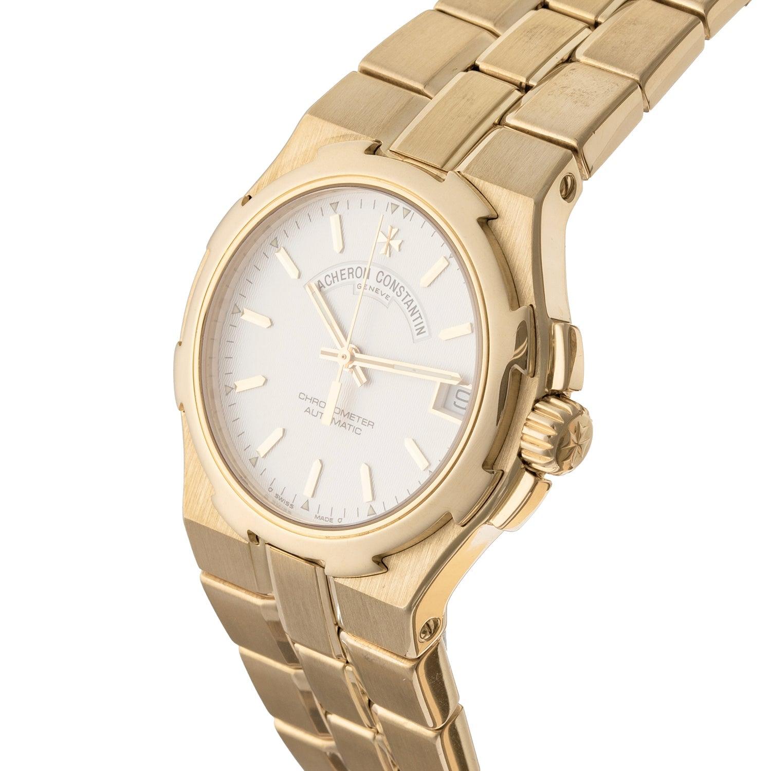 Mid-size version of the 'Overseas' wristwatch by Vacheron Constantin 42050/423J in 18 karat yellow gold. Featuring a self-winding movement. Impressive detail hand-guilloche silver dial with date display at 3 o'clock. Circular 35mm 18k yellow gold