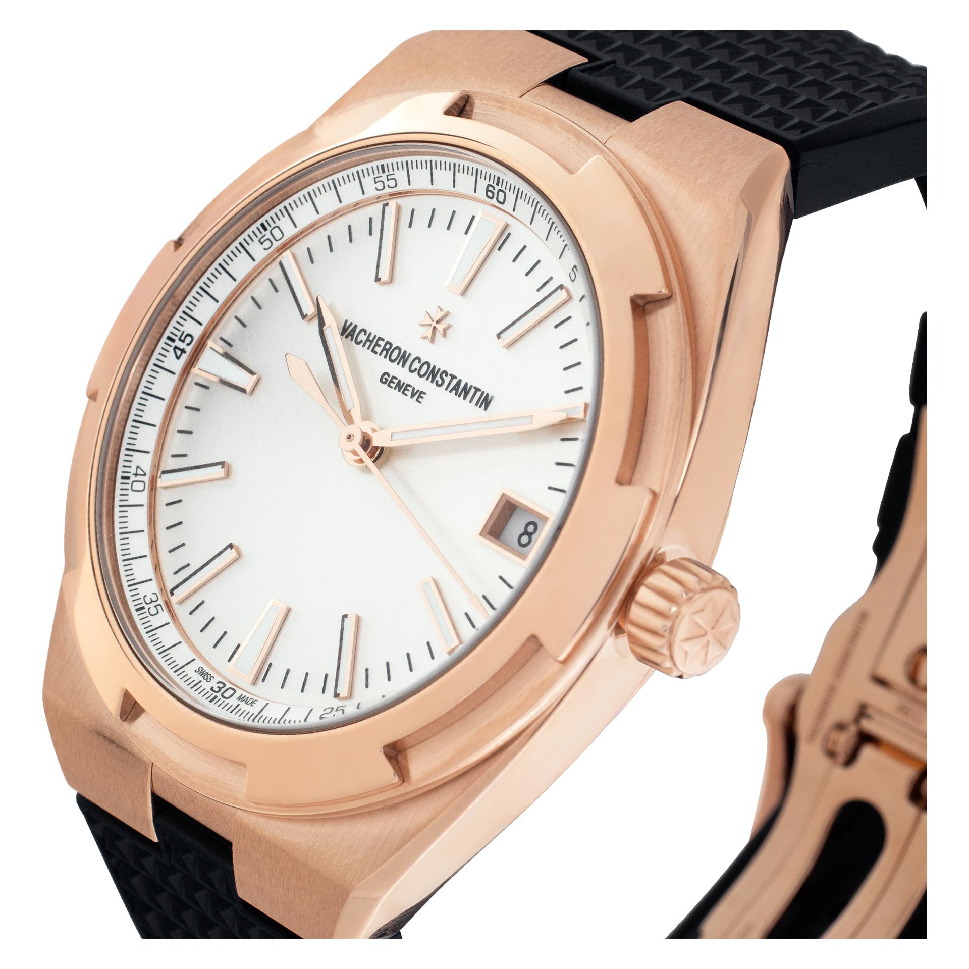 New Arrival! Vacheron Constantin Overseas in 18k rose gold on a blue rubber strap with deployant buckle. Auto w/ sweep seconds and date. 41 mm case size. Unused with brown leather strap, box and papers. **Bank wire only at this price** Ref