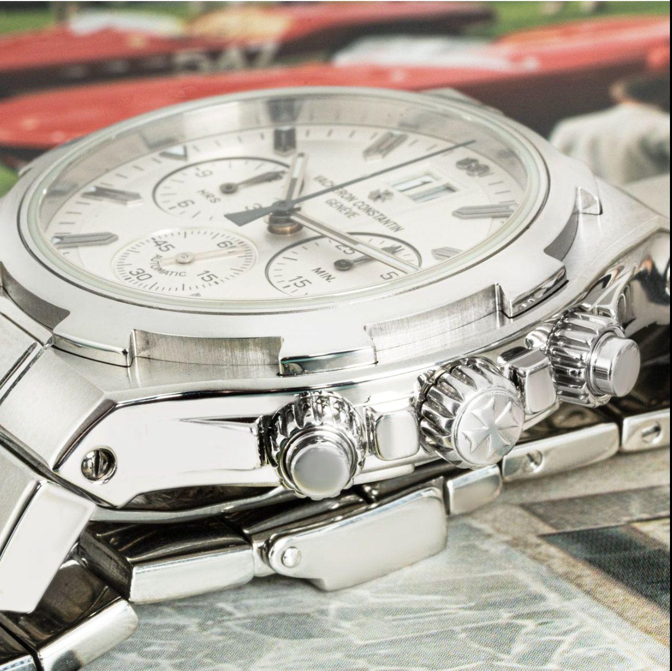 A stainless steel Overseas Chronograph wristwatch by Vacheron Constantin. Featuring a silver dial with applied hour markers, a date aperture, 3 chronograph counters and a fixed stainless steel bezel. Fitted with a sapphire glass, an automatic
