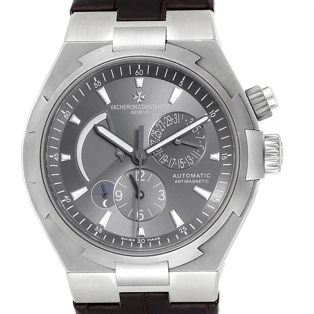Vacheron Constantin Overseas Dual Time Grey Dial Mens Watch 47450. Self-winding automatic movement. Brushed stainless steel case 42.5 mm in diameter. Screwd down crown and pushers. Logo on a crown. Solid case back with 'overseas' medalion. Fixed