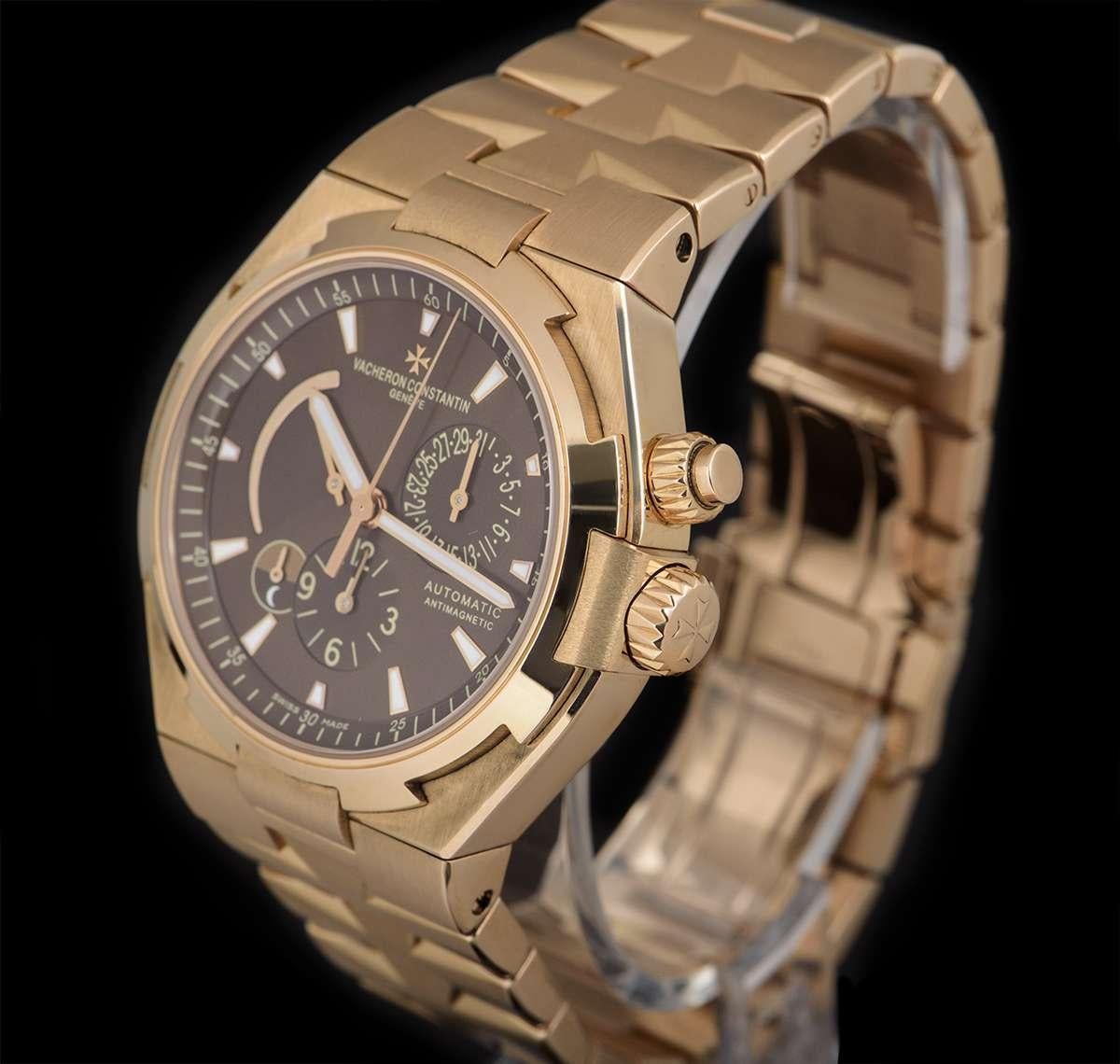 An 18k Rose Gold Overseas Gents Wristwatch, brown dial with applied hour markers, date sub-dial at 3 0'clock, second time zone at 6 0'clock, day/night indicator between 7 & 8 0'clock, power reserve indicator between 8 & 11 0'clock, a fixed 18k rose