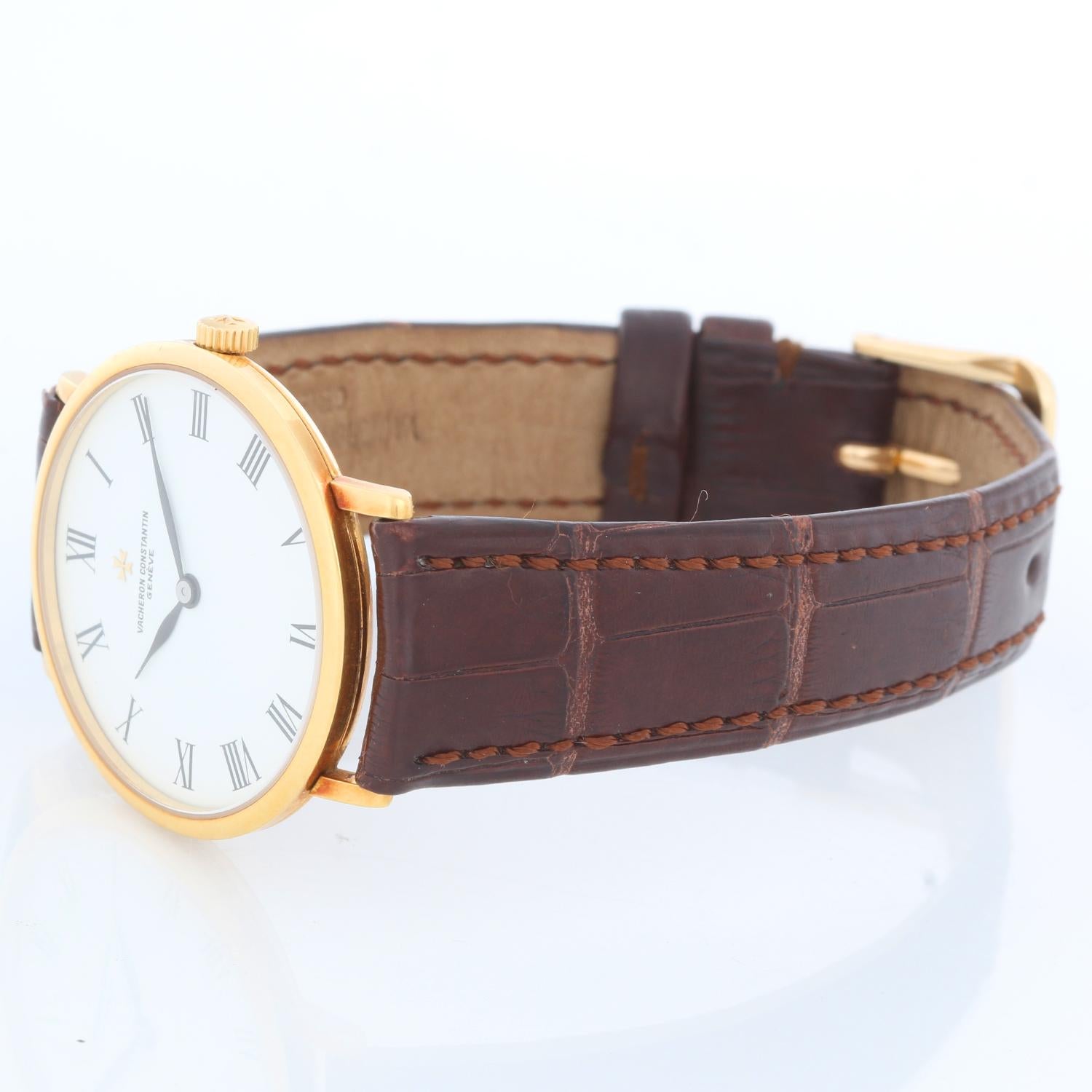 Vacheron Constantin Patrimony 18K Yellow Gold Ref 39039-2 - Manual winding. 18K yellow gold  ( 32 mm ). White dial with Roman numerals. Strap band with 18k white gold Vacheron Constantin  clasp. Pre-owned with Vacheron Constantin box. Circa 1980's.