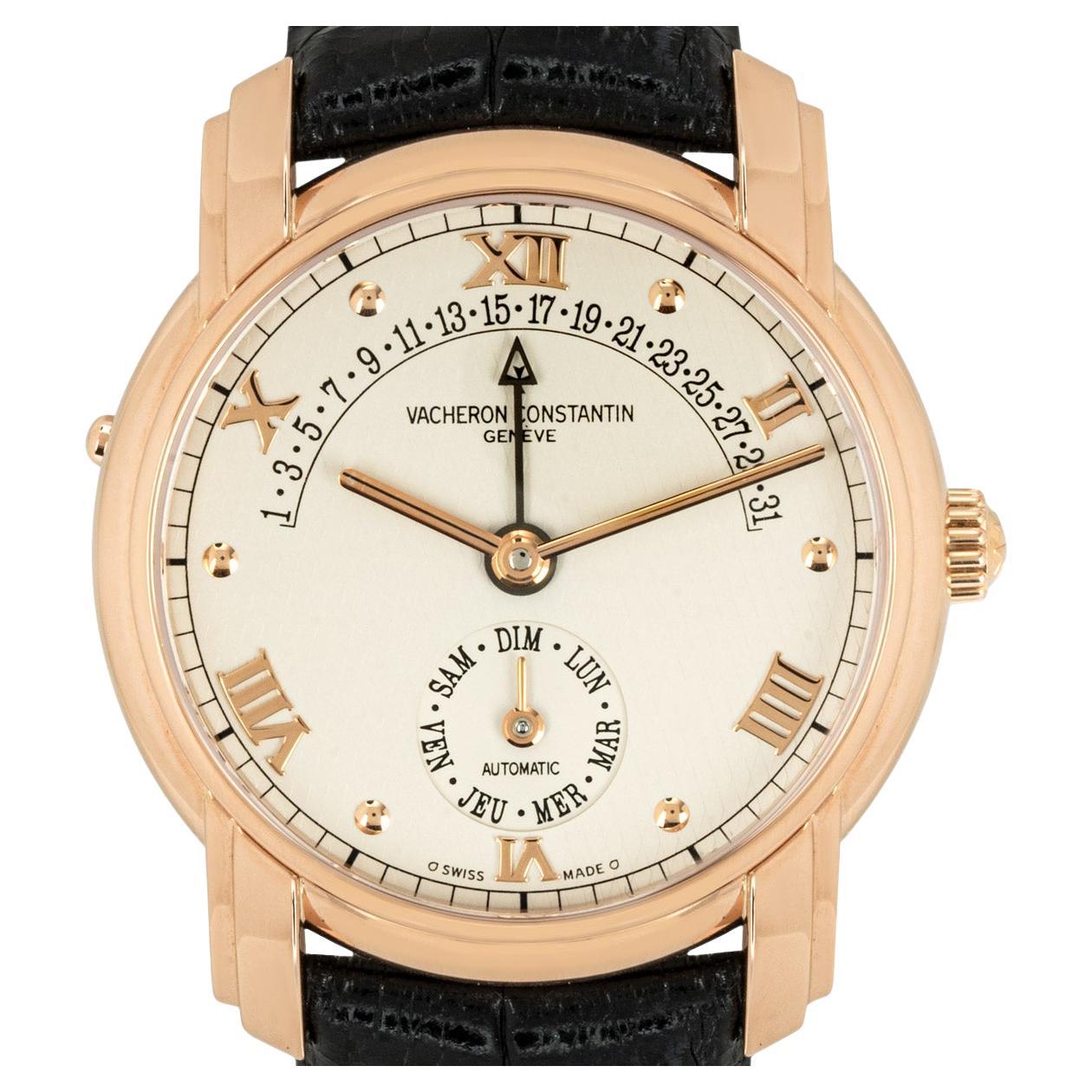 A 37mm mens Vacheron Constantin Patrimony 31 Day Retrograde, crafted in rose gold. Featuring a silver dial with applied roman numerals, a retrograde date indicator and a sub dial for the day. The watch is fitted with a sapphire glass, a self-winding