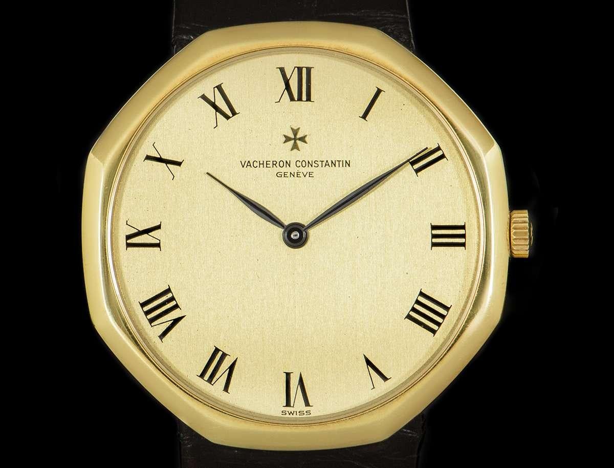 A rare 35mm Octagonal manual wind men's wristwatch, made from 18k yellow gold. 

Features a champagne dial with roman numerals, a fixed 18k yellow gold bezel, an original black leather strap with an original 18k yellow gold pin buckle and a sapphire
