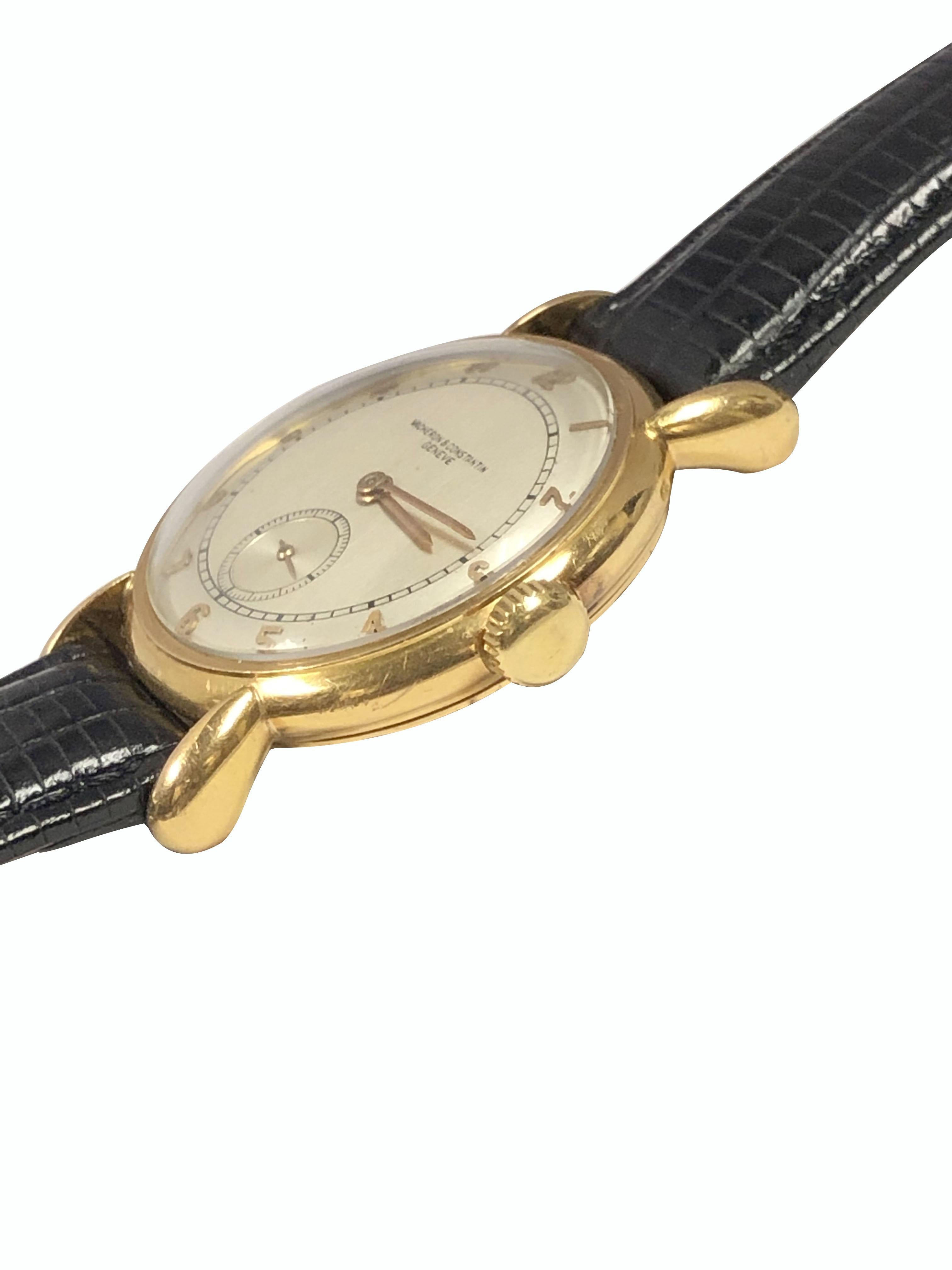 Circa late 1940s Vacheron & Constantin Wrist Watch, 32 M.M. 18K Rose Gold 2 Piece case with Water Proof back and Tear Drop lugs. 18 Jewel Mechanical, Manual wind movement. Original, Excellent Silver Satin Pie Pan Dial with raised Rose Gold Markers