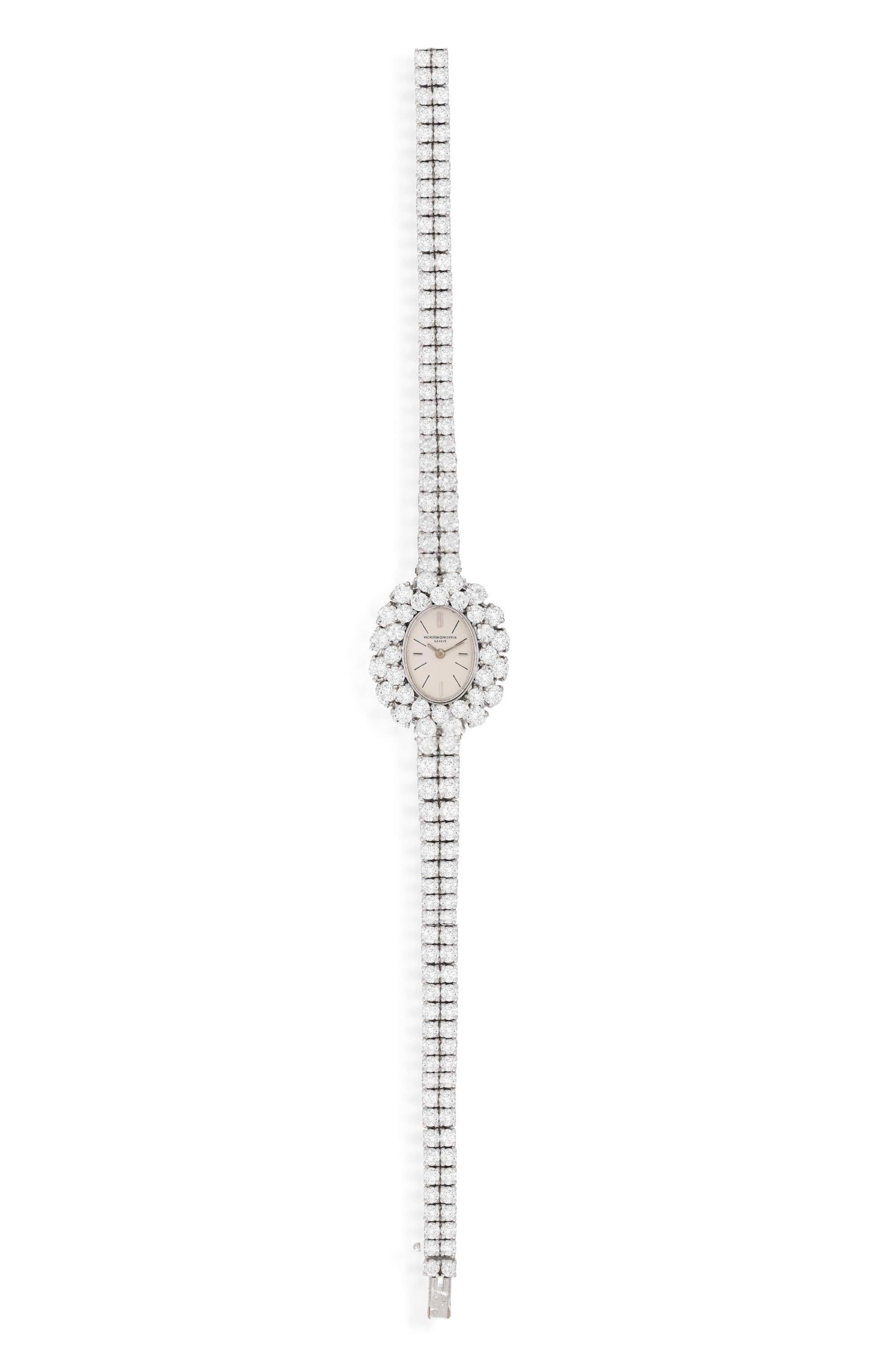 18k White Gold and Diamonds approximately 8.00cts total
Circa 1960s
17-jewel manual wind movement, the oval-shaped white dial with baton numerals and steel hands, the case highlighted with a double brilliant-cut diamond frame, to a fitted two row