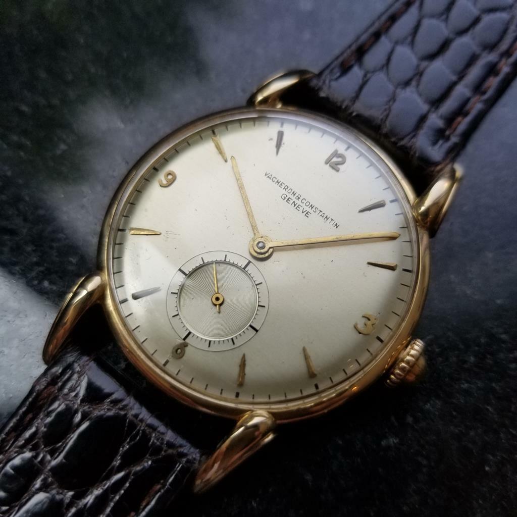 Timeless excellence, men's 18K solid gold Vacheron & Constantin manual hand-wind dress watch, c.1950s. Verified authentic by a master watchmaker. Gorgeous original silver Vacheron dial, applied gold dagger and Arabic numeral hour markers, gold