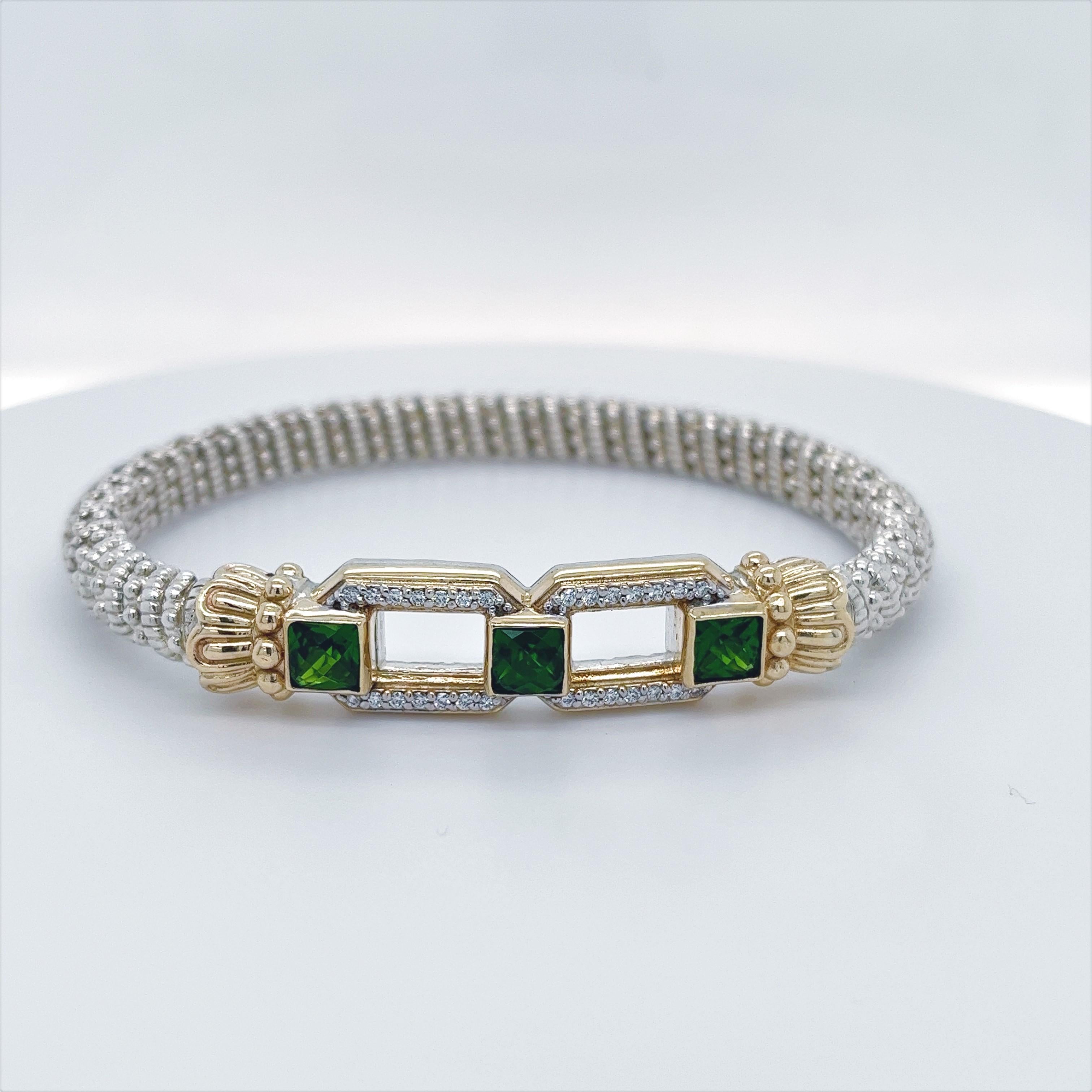 All of your friend's will be in a flutter when they see this beautiful bracelet gracing your wrist. This 8mm bracelet by Alwand Vahan is sterling silver, 14k yellow gold, and has .21 carats of diamonds and three princess cut green chrome diopside