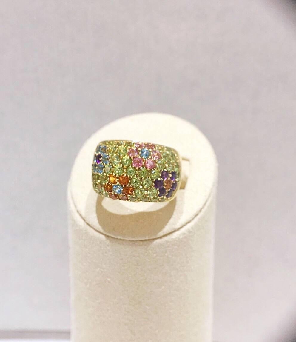 Italian Jewelers for more than three generations, VAID has produced merchandise exclusively for some of the most renowned jewelers across the world. This VAID designed  18-karat yellow gold band is set with amethyst, citrine, pink tourmaline and